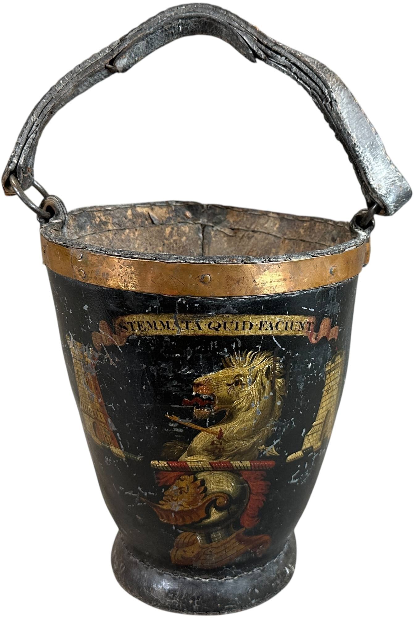 EARLY DECORATED LEATHER FIRE BUCKET: 356. EARLY DECORATED LEATHER FIRE BUCKET | c. early to mid 1800's, English polychrome leather fire bucket with copper trim, coat of arms and banner that reads "STEMMATA QUID FACIUNT" relating to the