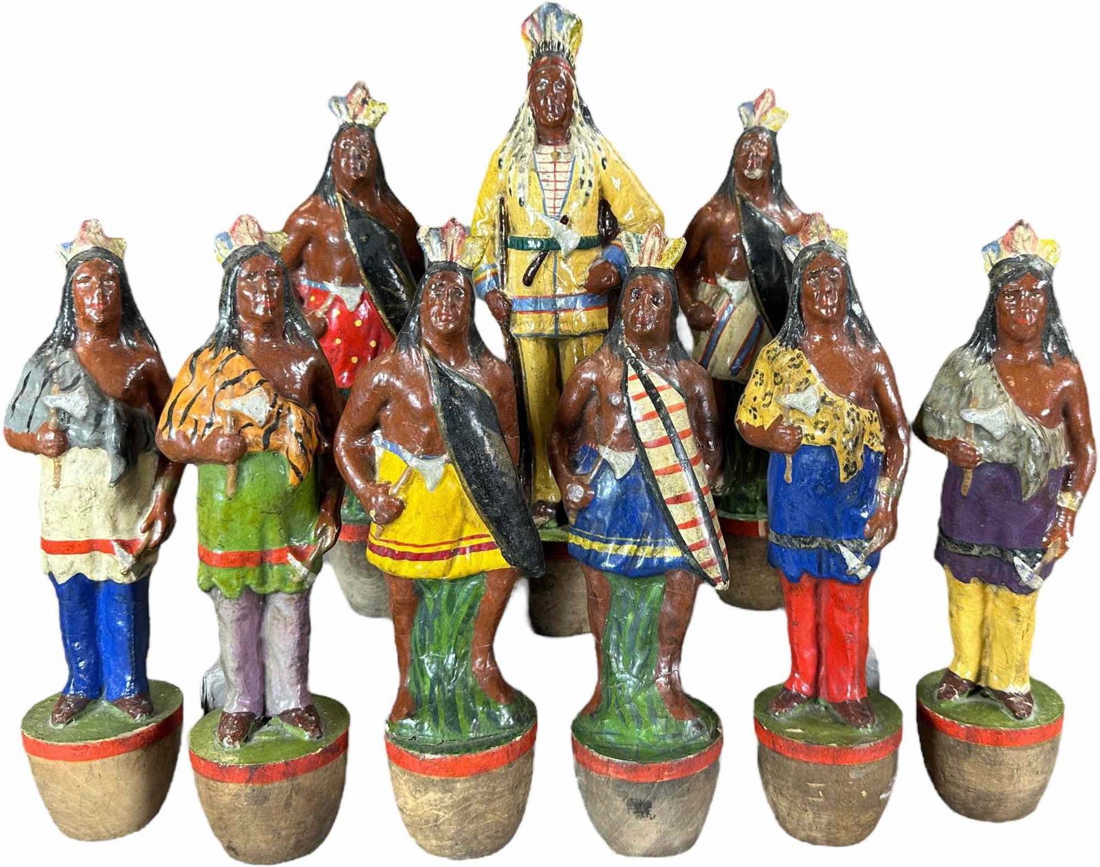 NATIVE AMERICAN NINE PIN SKITTLES: 360. NATIVE AMERICAN NINE PIN SKITTLES | Germany, painted composition on wood, colorful and very detailed, a great form and subject matter. | 10.5" h. | Great set is untouched, (Excellent Condition)