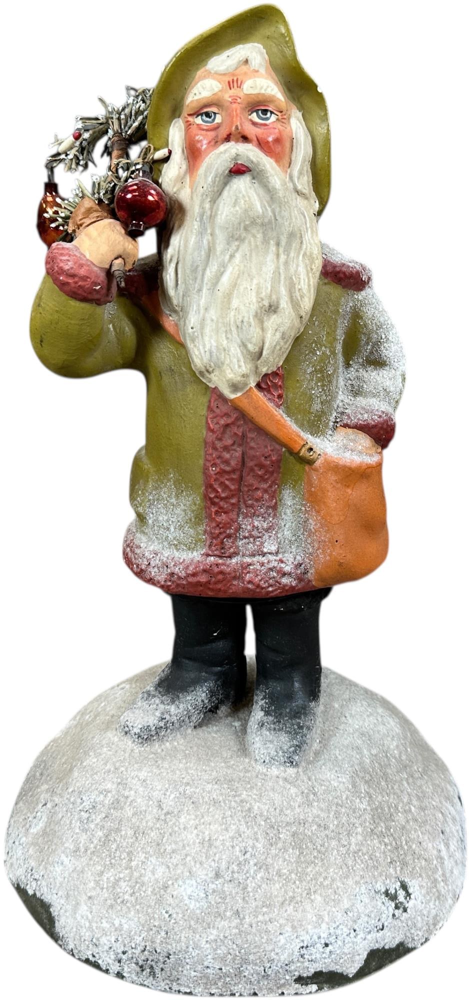 ARTISAN MADE SANTA ON SNOW MOUND: 1006. ARTISAN MADE SANTA ON SNOW MOUND | Seemingly newer vintage piece is very well done. Provenance: Ed & Brenda DeGarbolewski Collection. | 12" h. | (Excellent Condition) | $600 - $1,200