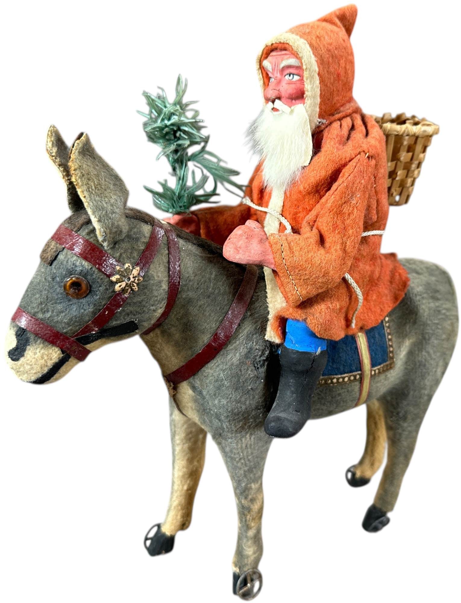 GERMAN SANTA RIDING DONKEY PULL TOY: 1032. GERMAN SANTA RIDING DONKEY PULL TOY | Donkey is on small metal wheels. Provenance: Linda Morrow Collection | 8.5" l. | (Excellent Condition) | $600 - $1,000
