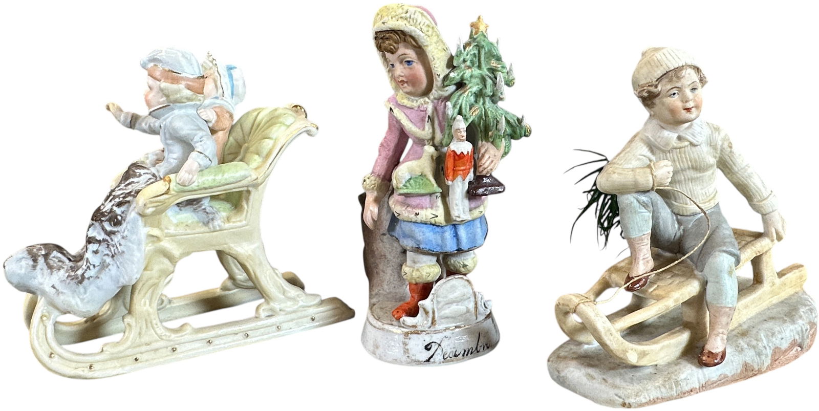 THREE PORCELAIN WINTER FIGURES: 1058. THREE PORCELAIN WINTER FIGURES | Beautiful figures with excellent details. | 5" h. | (Pristine Condition) | $400 - $600