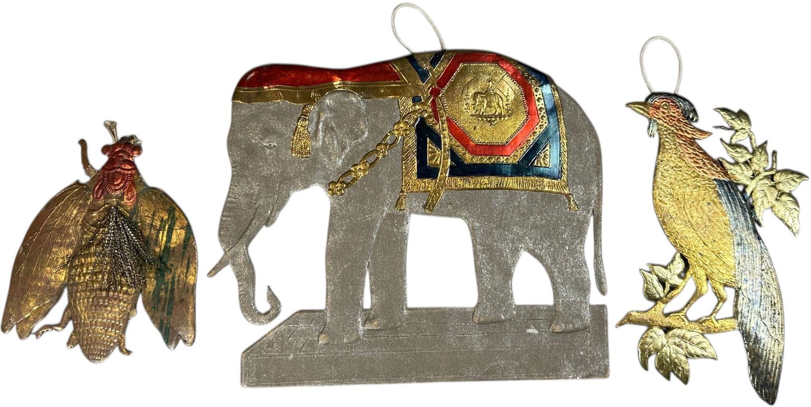 THREE FLAT DRESDEN ANIMAL ORNAMENTS: 1066. THREE FLAT DRESDEN ANIMAL ORNAMENTS | Bug is missing a leg. | 8.5" h. | (Excellent Condition) | $250 - $500