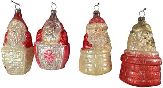 FOUR SANTA IN CHIMNEY GLASS ORNAMENTS