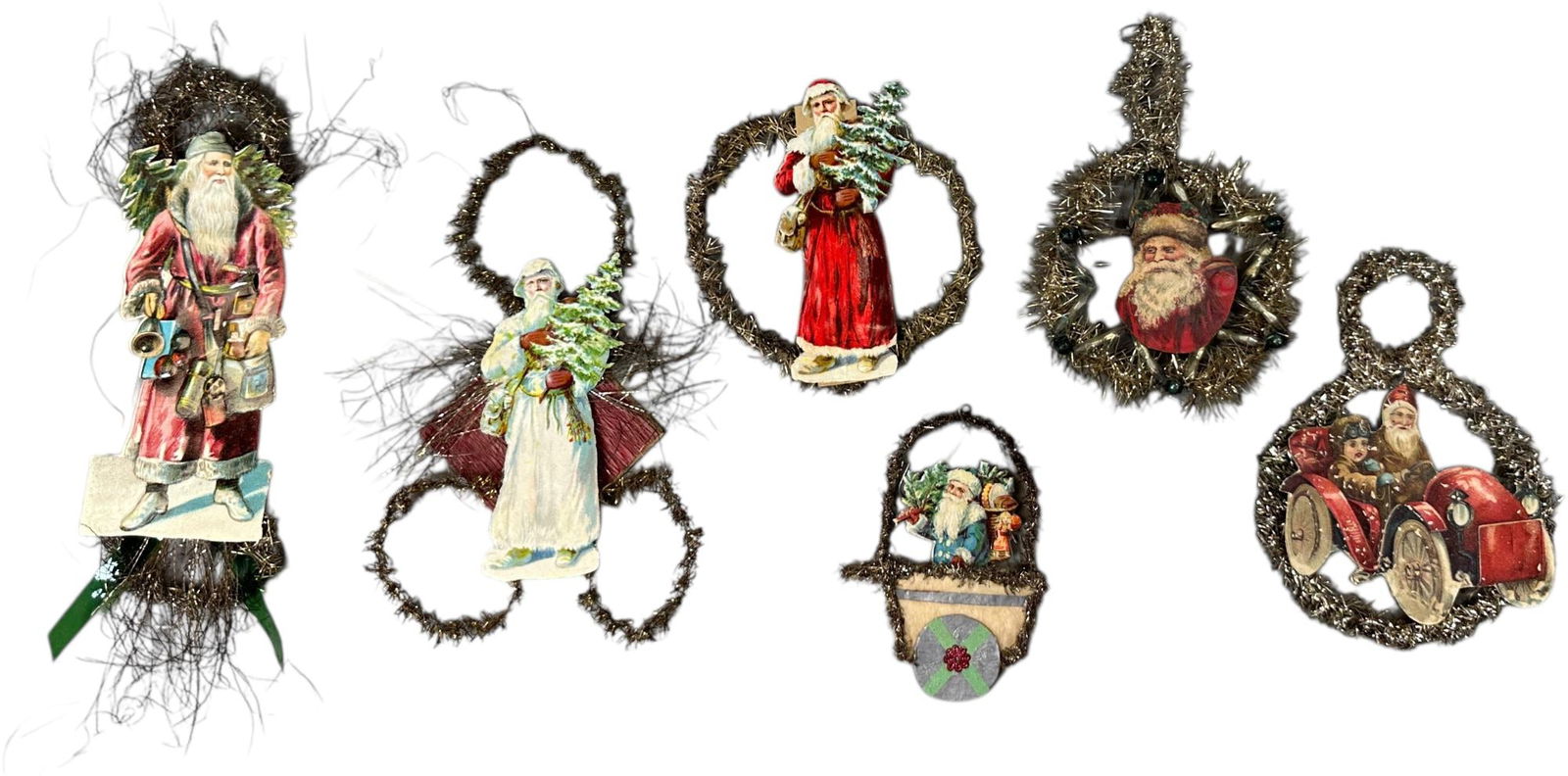 SIX SANTA PAPER & TINSEL ORNAMENTS: 1118. SIX SANTA PAPER & TINSEL ORNAMENTS | Provenance: Linda Morrow Collection | 6" h. | (Excellent Condition) | $500 - $900