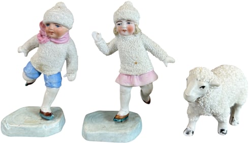 THREE PORCELAIN SNOW FIGURES