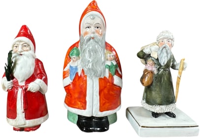 THREE CERAMIC SANTAS FIGURINES