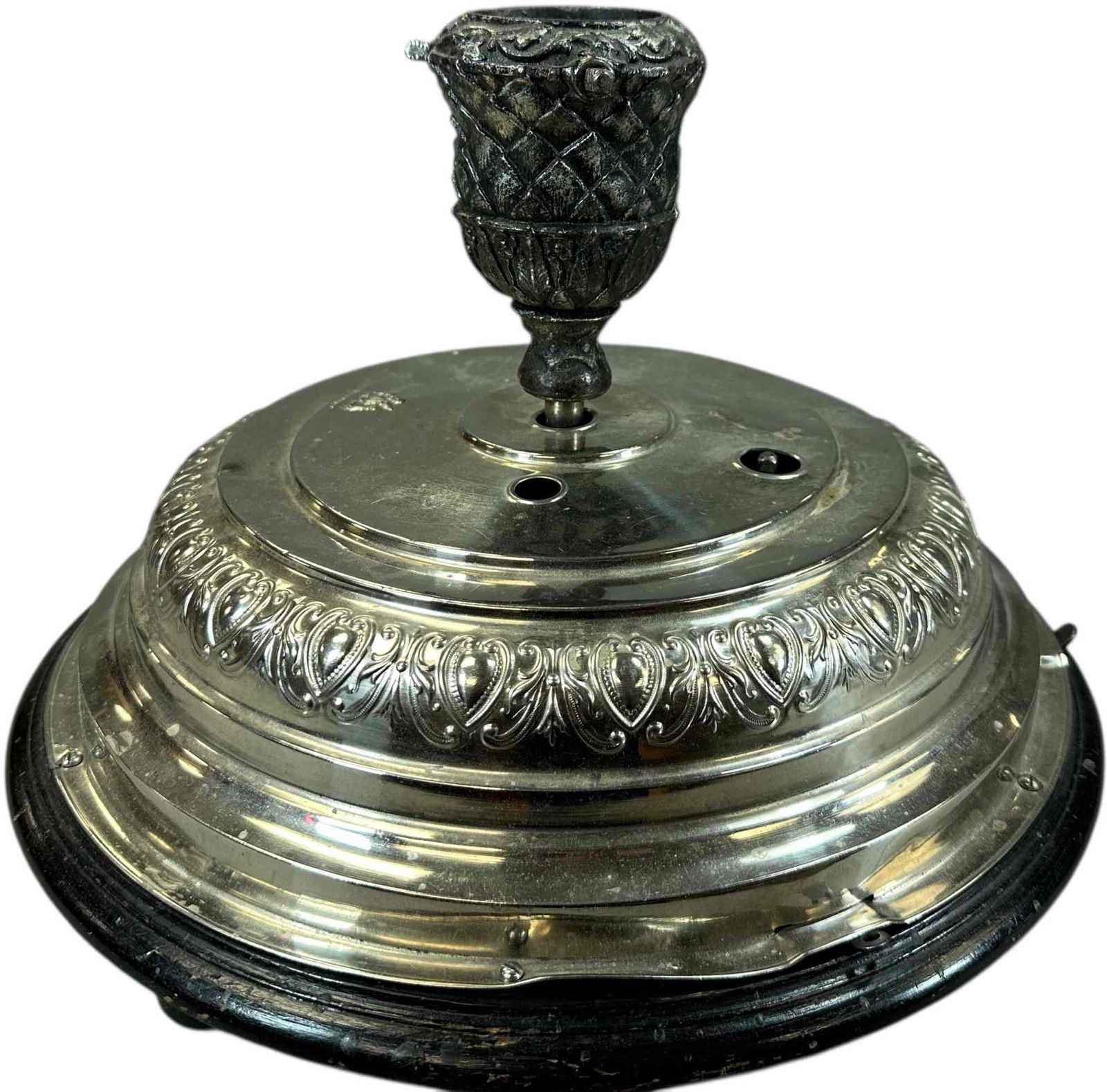 CLOCKWORK MUSICAL CHRISTMAS TREE STAND: 1168. CLOCKWORK MUSICAL CHRISTMAS TREE STAND | Revolves and plays Christmas tunes when activated. | 15" dia | (Excellent Condition) | $300 - $600