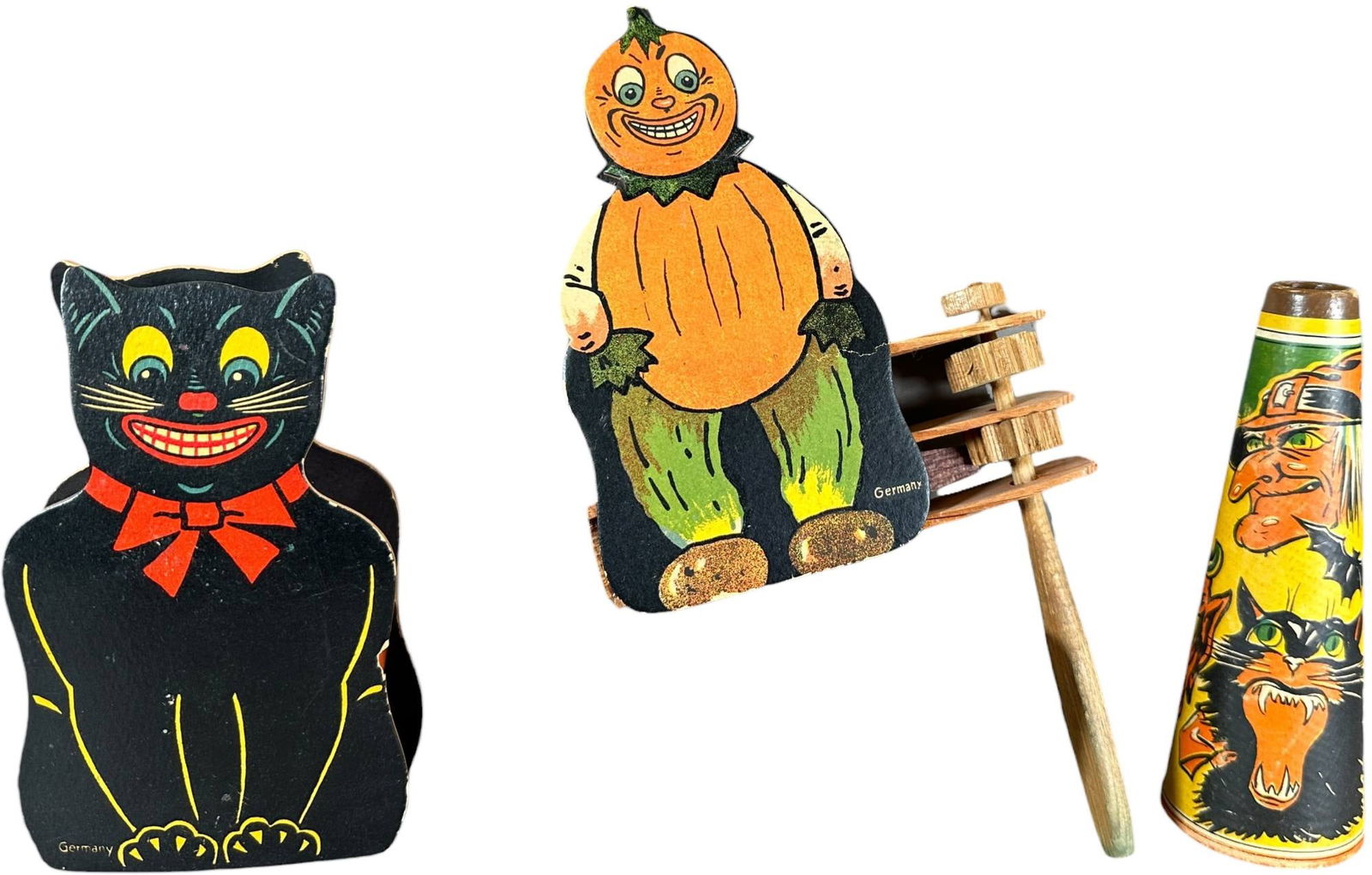 THREE PAPER LITHO NOISE MAKERS: 1177. THREE PAPER LITHO NOISE MAKERS | Hard cardboard, two are marked Germany. | 5" h. | (Excellent Condition) | $400 - $700