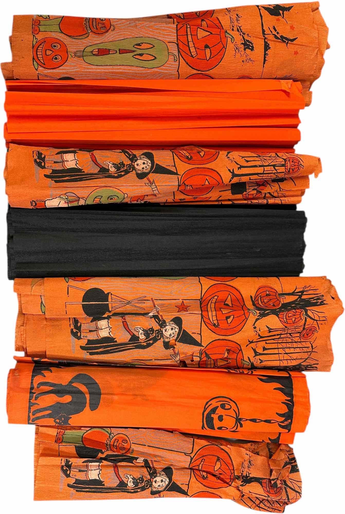 SEVEN PIECES OF HALLOWEEN CREPE PAPER TABLECLOTHS: 1192. SEVEN PIECES OF HALLOWEEN CREPE PAPER TABLECLOTHS | Some minor tears and breakage to ends of printed pieces, (Very Good to Excellent Condition), solid pieces are ppp. Provenance: Beth Karp