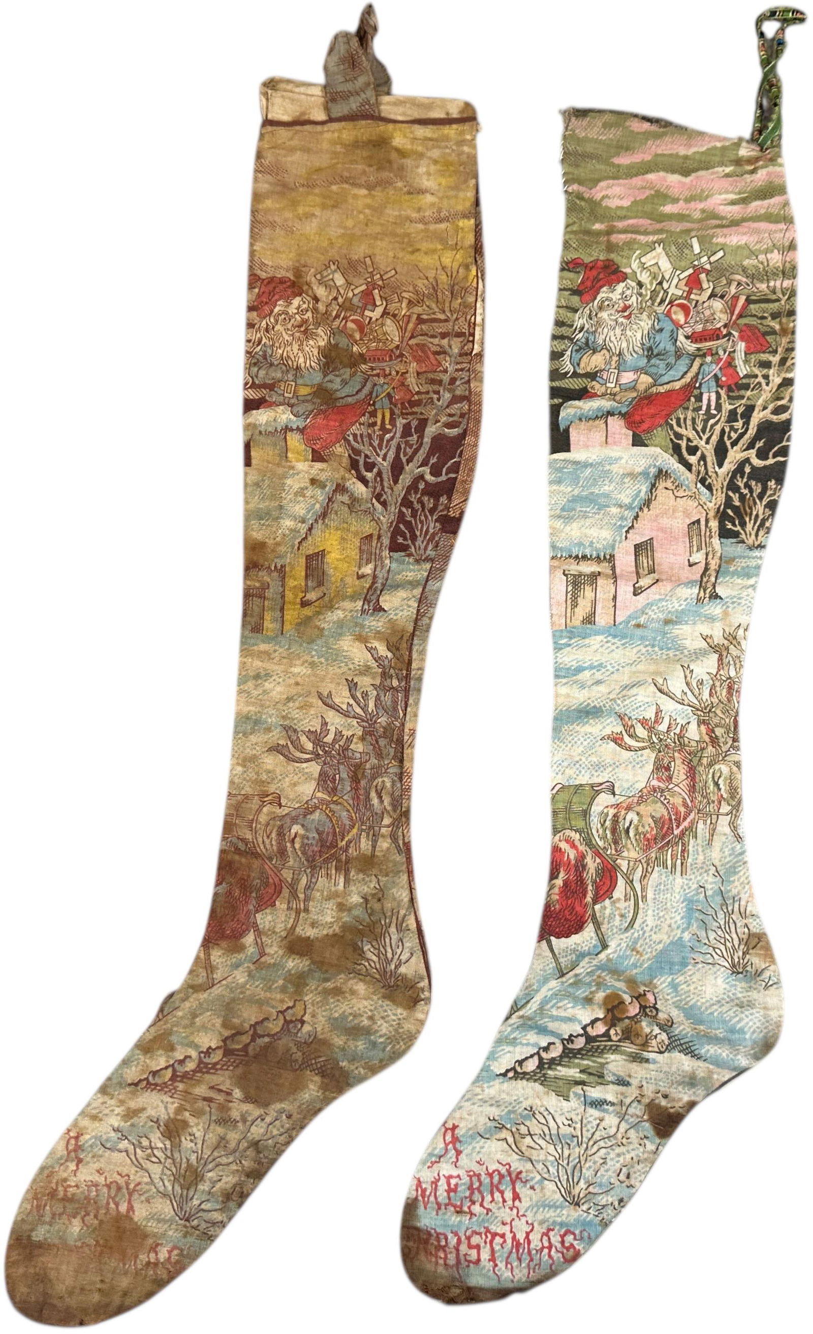 TWO CLOTH CHRISTMAS STOCKINGS: 1199. TWO CLOTH CHRISTMAS STOCKINGS | Provenance: Bob & Maurine Young | 30" l. | (Excellent Condition) | $500 - $800