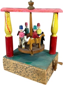 EARLY GERMAN CAROUSEL MECHANICAL TOY