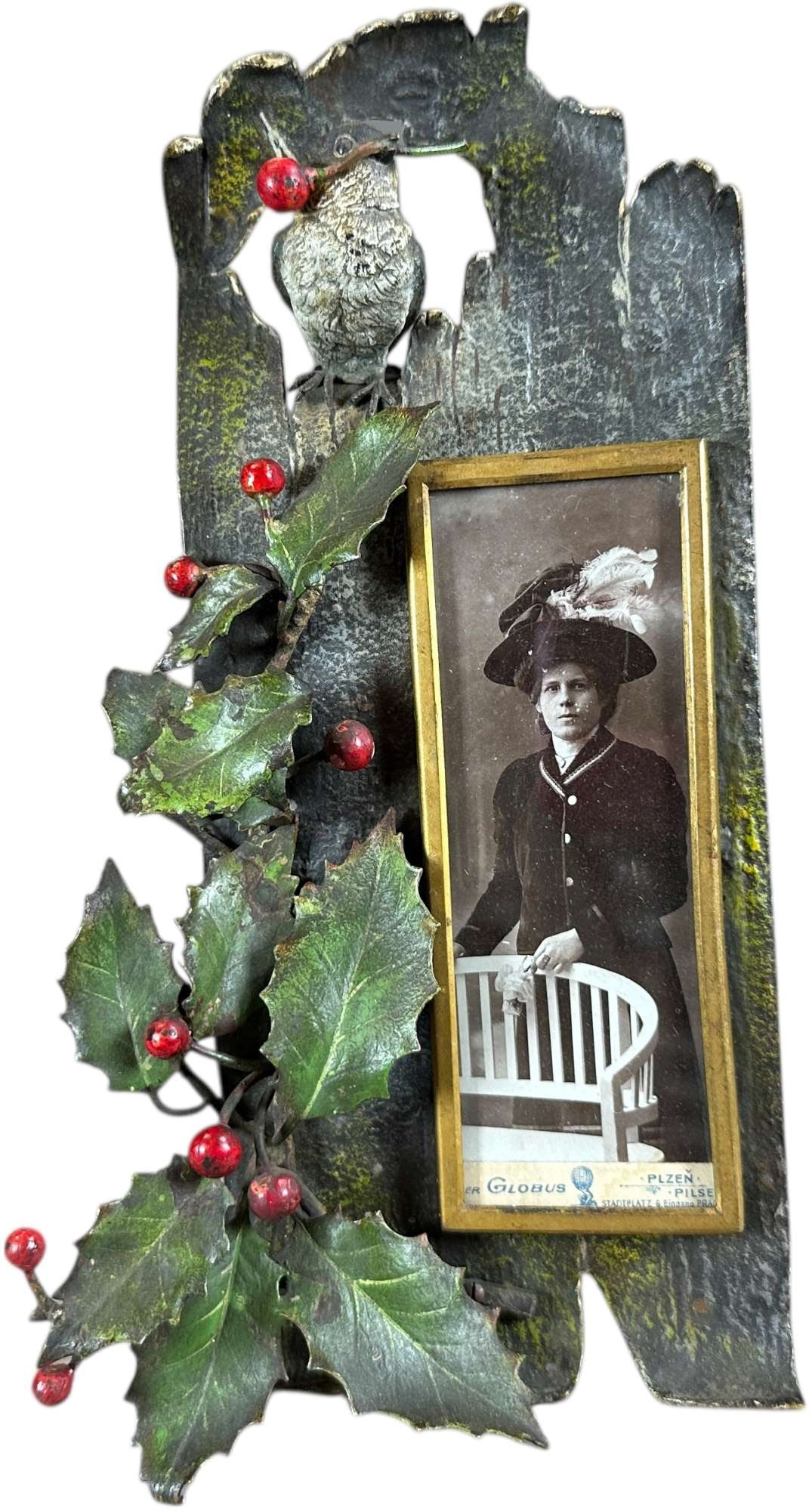 METAL HOLLY CHRISTMAS PICTURE FRAME: 1226. METAL HOLLY CHRISTMAS PICTURE FRAME | Accented with holly and a bird with berry. | 9" h. | (Excellent Condition) | $300 - $500