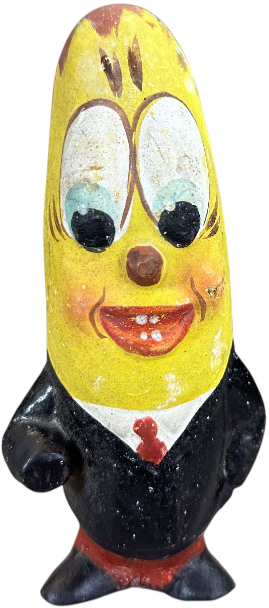 GERMAN BANANA MAN CANDY CONTAINER: 1230. GERMAN BANANA MAN CANDY CONTAINER | Provenance: Linda Morrow Collection | 7" h. | (Excellent Condition) | $500 - $1,000