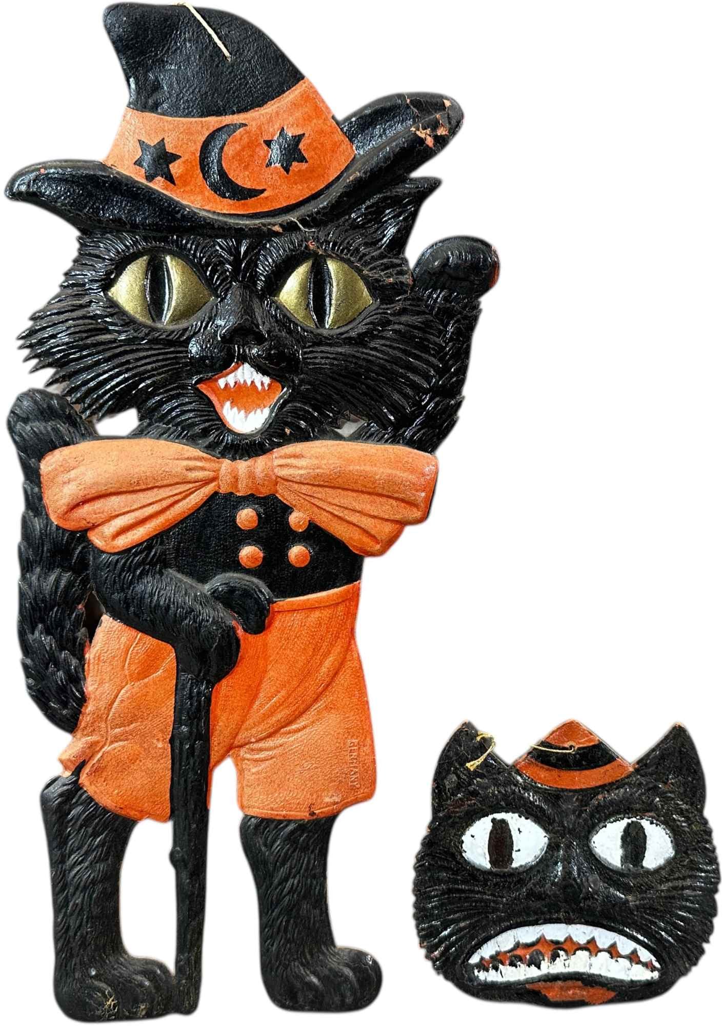 TWO GERMAN HALLOWEEN CAT DIE-CUTS: 1247. TWO GERMAN HALLOWEEN CAT DIE-CUTS | Very nice cat head. | 15.5" h. | Some paint flaking and paper creases, overall (Very Good to Excellent Condition) | $250 - $500