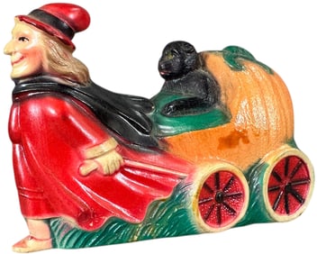 CELLULOID WITCH PULLING CAT IN PUMPKIN CART