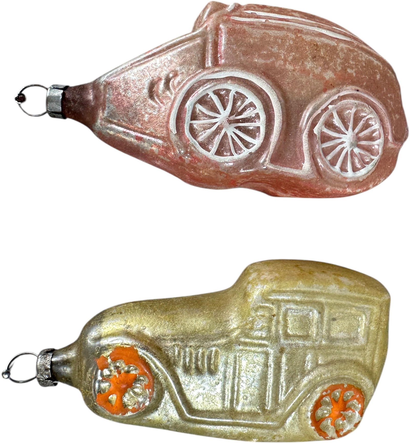 TWO CAR GLASS ORNAMENTS: 1284. TWO CAR GLASS ORNAMENTS | Wedge shaped future car. | 4" h. | (Excellent Condition) | $400 - $700