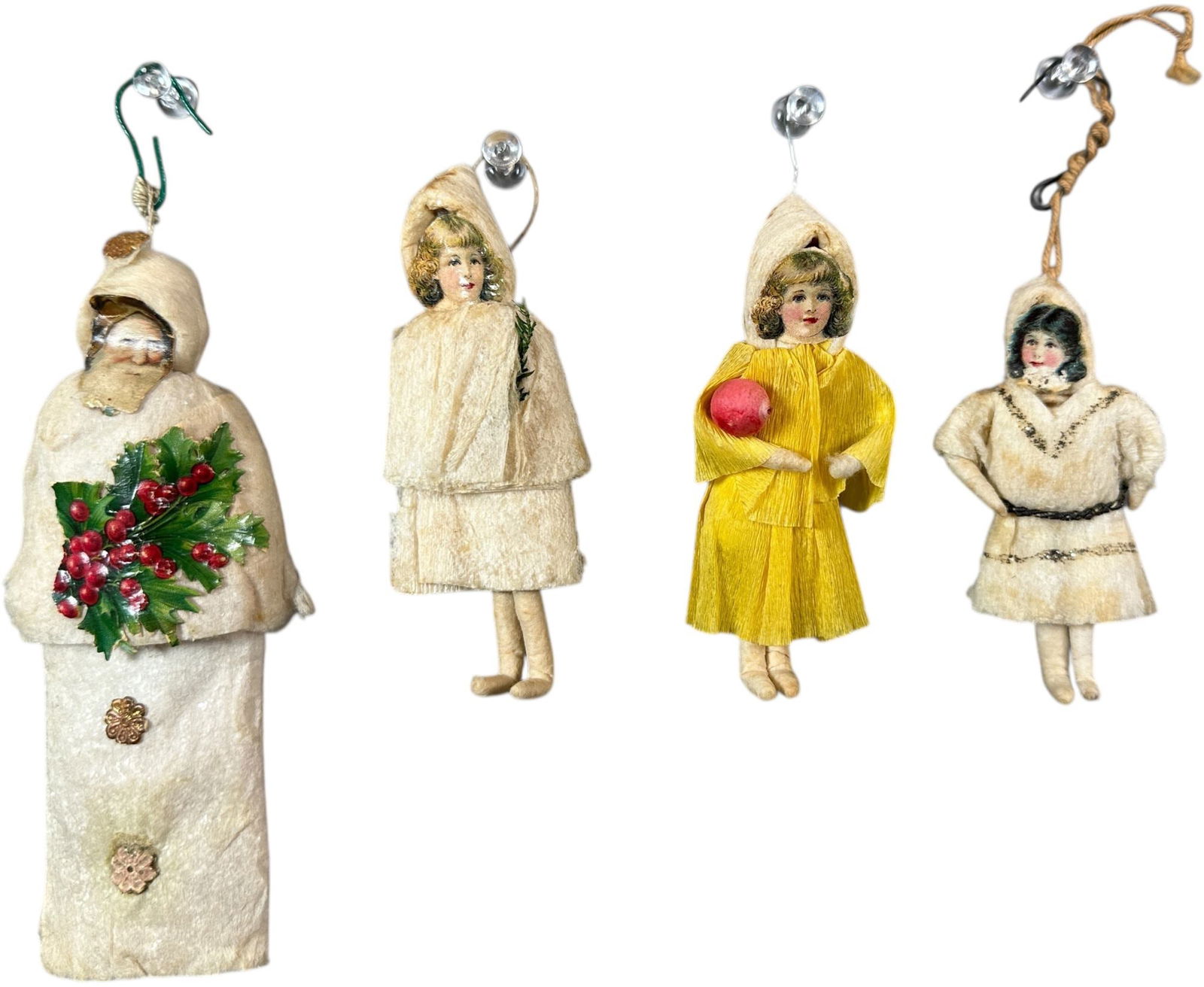 FOUR SCRAP FACE COTTON ORNAMENTS: 1289. FOUR SCRAP FACE COTTON ORNAMENTS | Includes a Santa and three children. | 5.5" h. | (Excellent to Pristine Condition) | $400 - $700