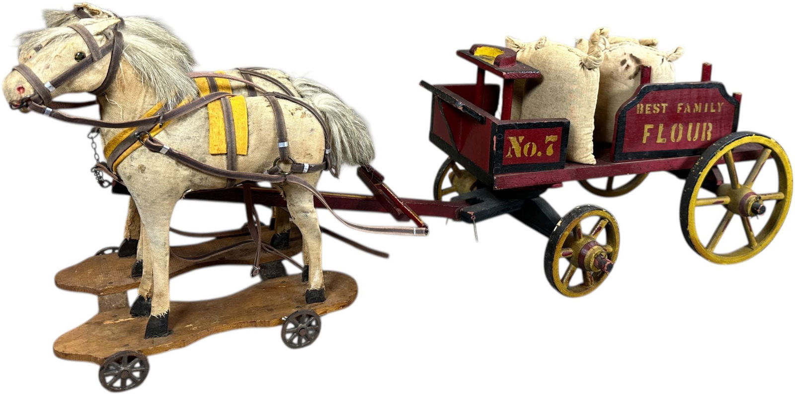 GERMAN HORSE DRAWN WOODEN FLOUR WAGON: 1296. GERMAN HORSE DRAWN WOODEN FLOUR WAGON | 27" l. | Wear to horses, (Very Good to Excellent Condition) | $150 - $300