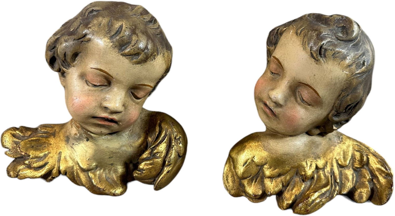 TWO WOODEN ORNAMENTAL CHERUBS: 1303. TWO WOODEN ORNAMENTAL CHERUBS | 7.5" h. | (Excellent Condition) | $200 - $400