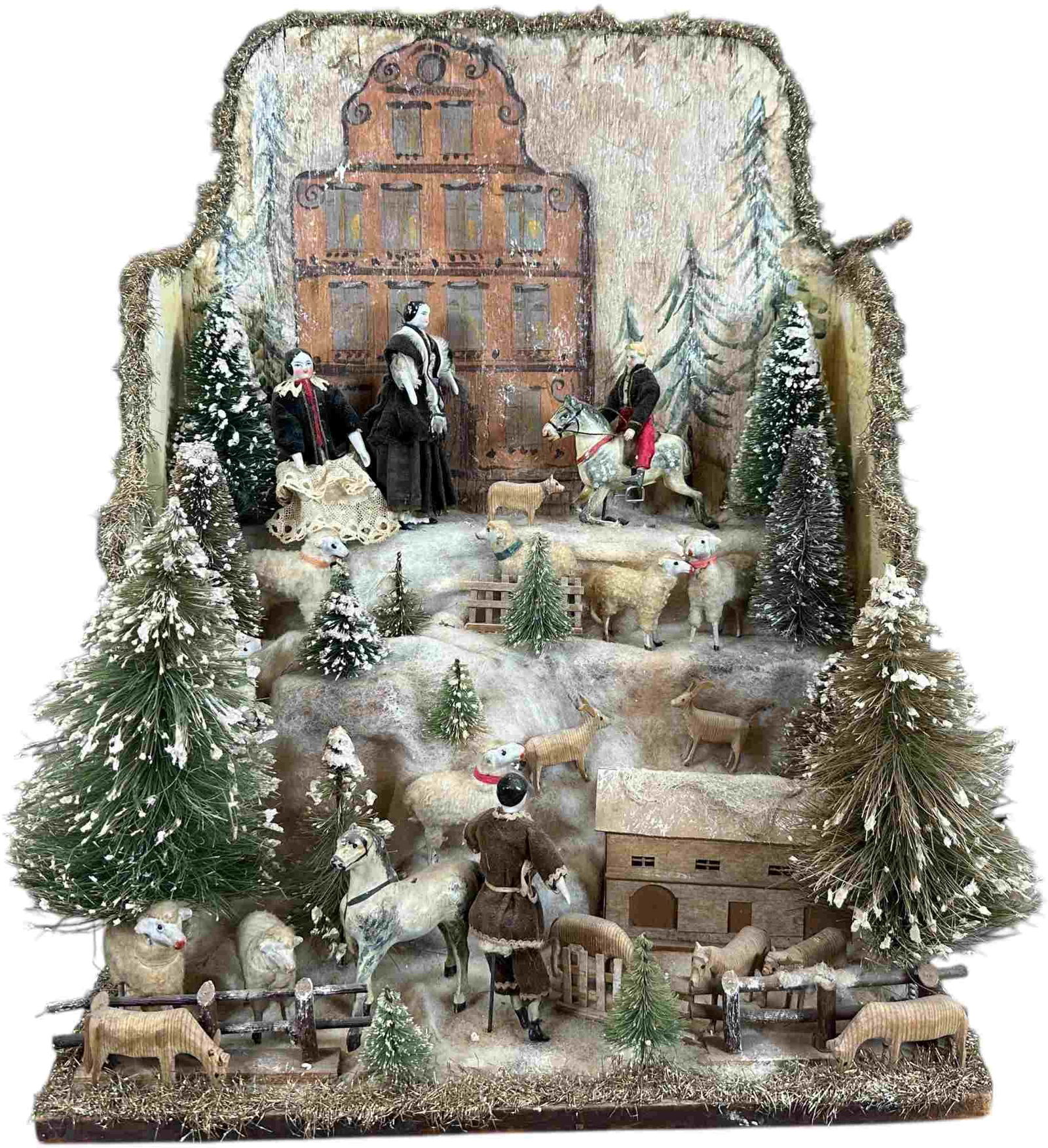 BAVARIAN CHRISTMAS SCENE DISPLAY SETTING: 1313. BAVARIAN CHRISTMAS SCENE DISPLAY SETTING | Lovely mountain side scene depicting villagers and sheep. Multi tier diorama includes a free hand painted style scene with Biedermeier style dolls.
