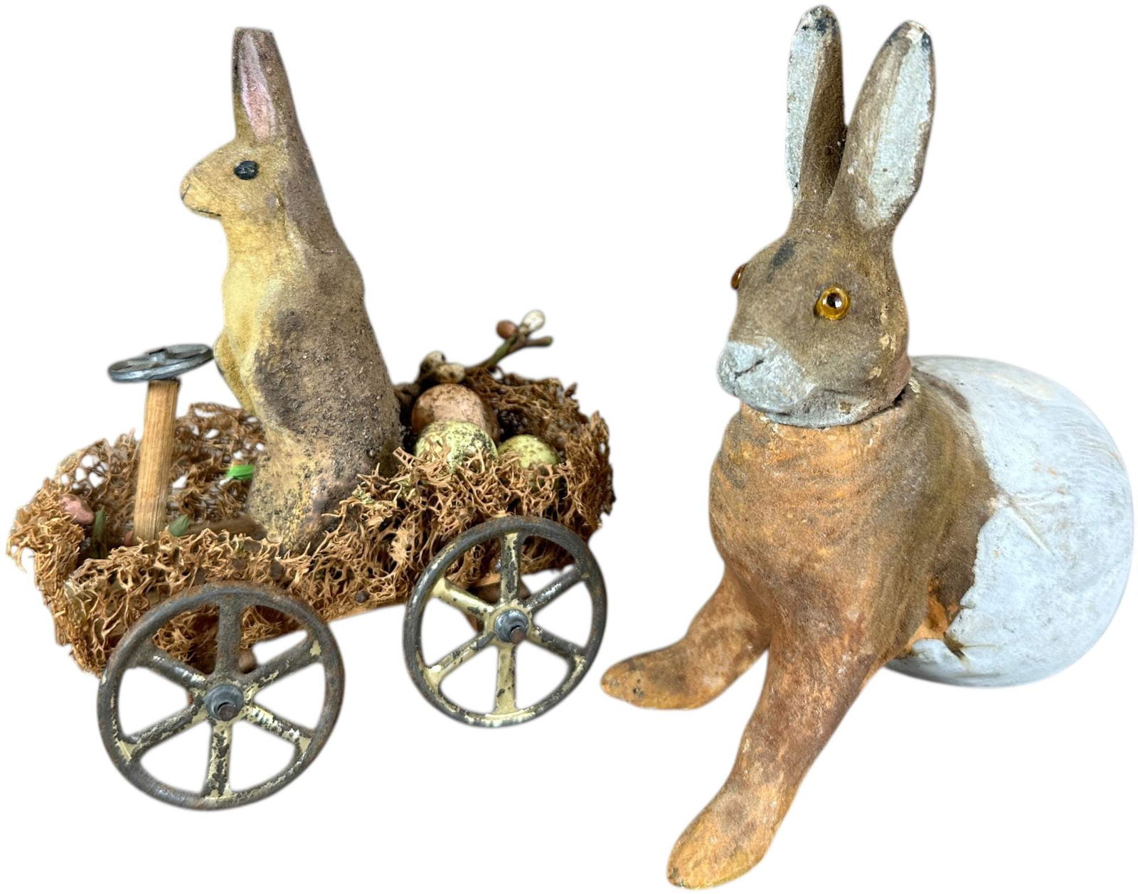 TWO RABBIT CANDY CONTAINER & CART: 1326. TWO RABBIT CANDY CONTAINER & CART | Provenance: Linda Morrow Collection | 5" h. | Rabbit in egg has two repaired legs, (Very Good to Excellent Condition) | $400 - $800