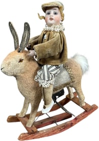 BOY ON WIND-UP ROCKING RABBIT