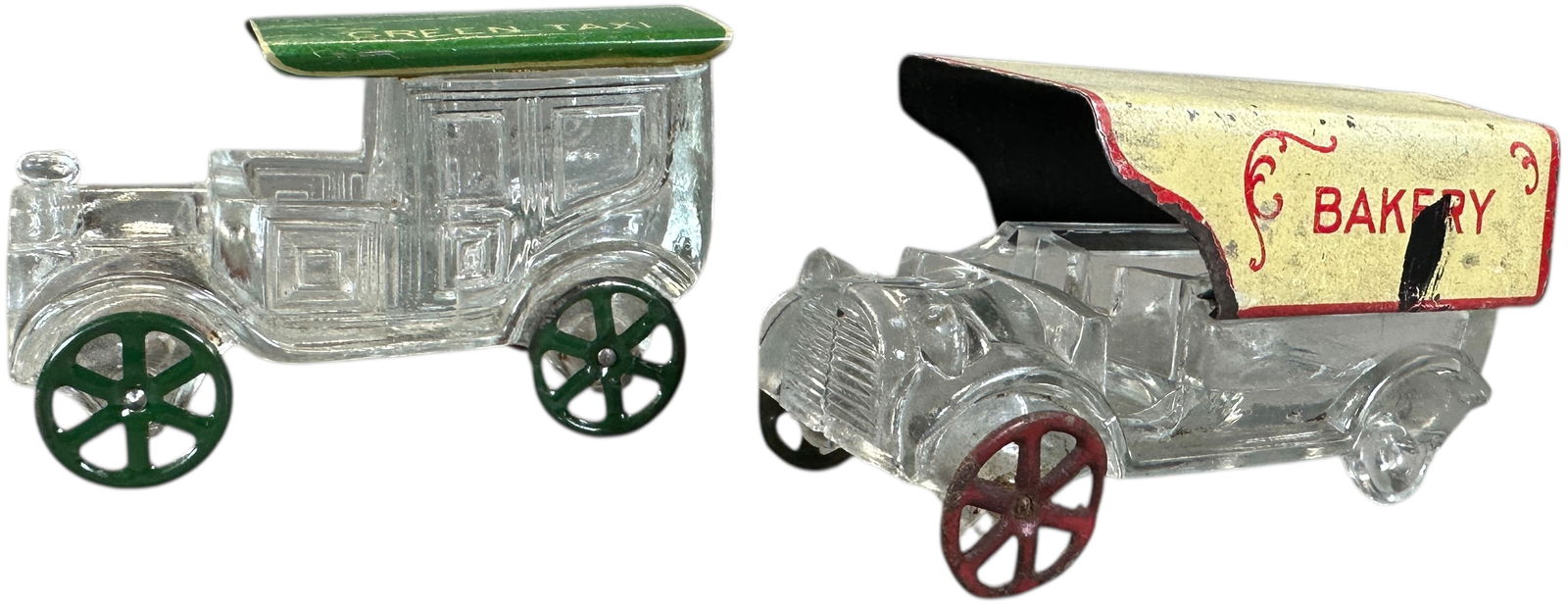 GREEN TAXI & BAKERY TRUCK GLASS CANDY CONTAINERS: 1332. GREEN TAXI & BAKERY TRUCK GLASS CANDY CONTAINERS | 4.5" l. | Bakery missing back wheels (Very Good Condition) | $400 - $600