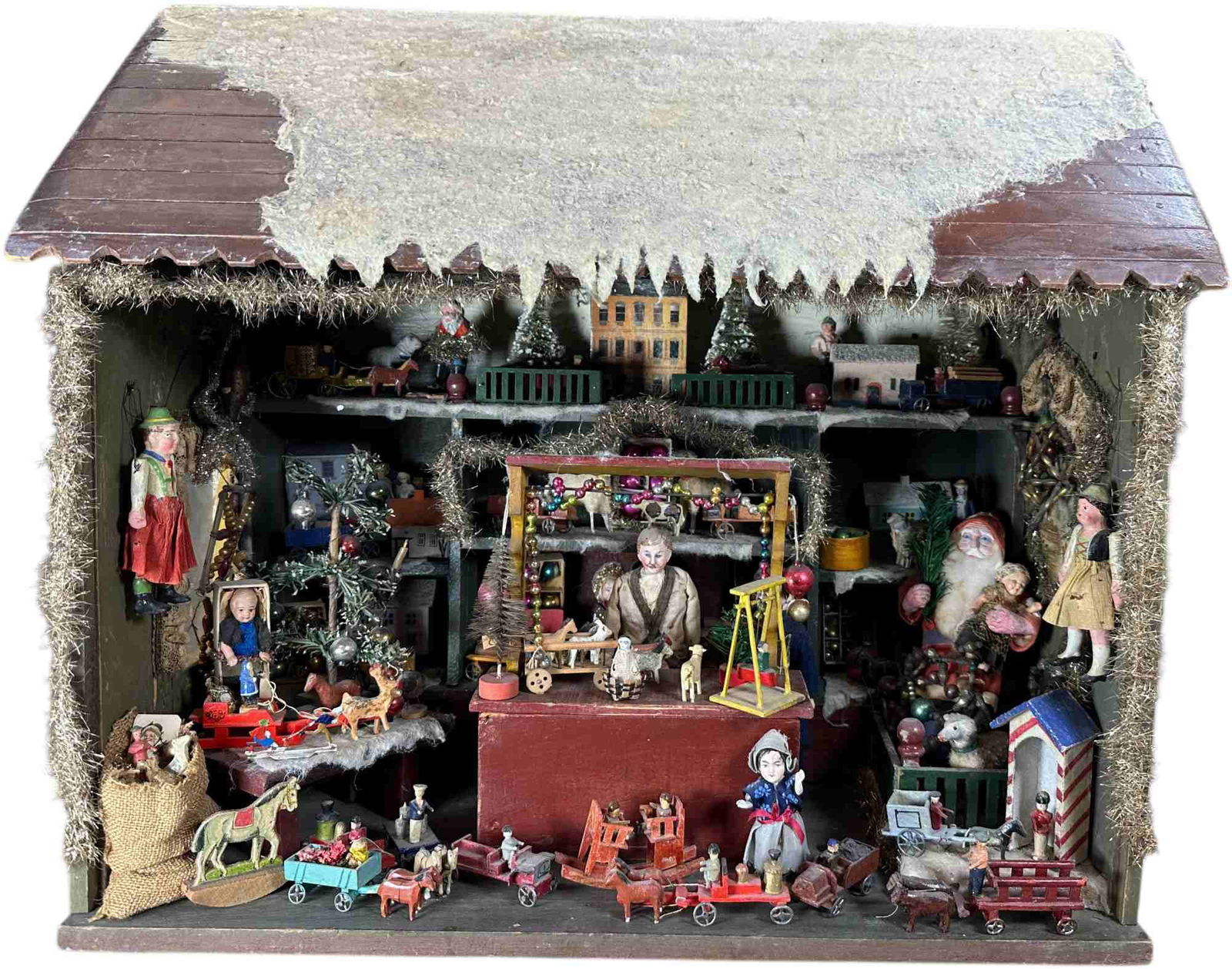 LARGE CHRISTMAS SHOP DISPLAY SCENE: 1352. LARGE CHRISTMAS SHOP DISPLAY SCENE | Artisan made Christmas stall with old and vintage items. Provenance: Bob & Maurine Young | 21 x 12 x 20" lwh. | Assembled display using primarily old