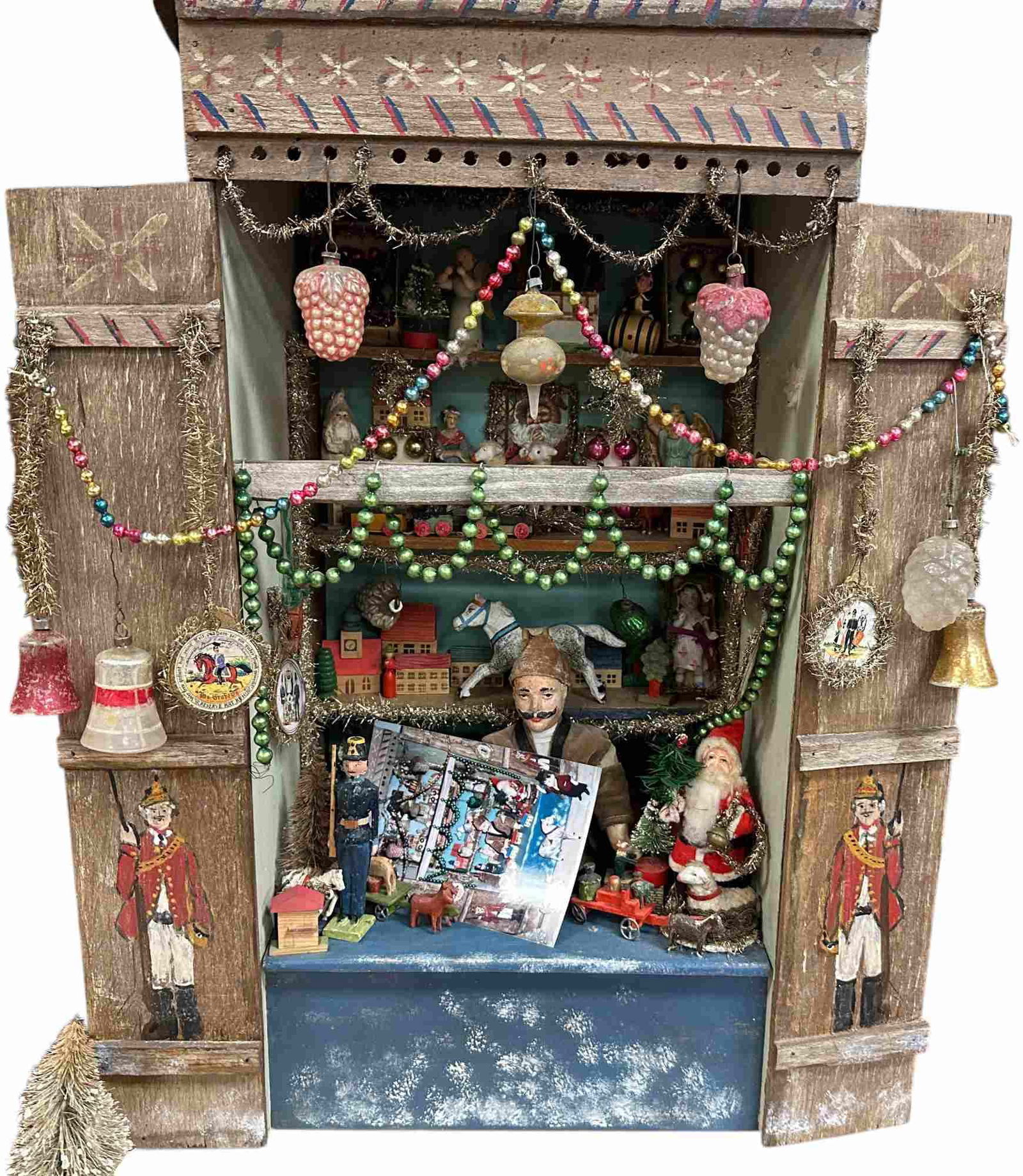 CHRISTMAS MARKET TOY STALL: 1356. CHRISTMAS MARKET TOY STALL | Artisan made. Provenance: Bob & Maurine Young | 18.5 x 10.5 x 24" lwh. | Assembled display using primarily old parts and items, (Excellent Condition) | $400 - $800