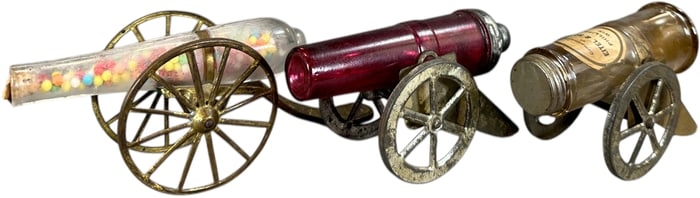 THREE CANNON GLASS CANDY CONTAINERS