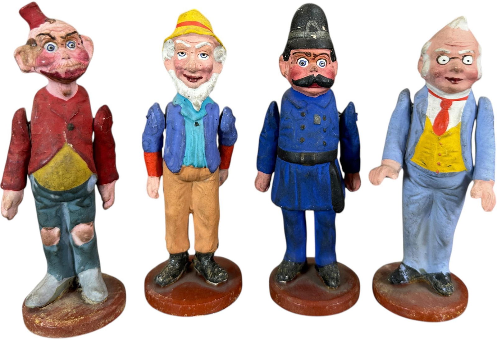 FOUR SMALL GERMAN COMPO FIGURES MOVING ARMS: 1379. FOUR SMALL GERMAN COMPO FIGURES MOVING ARMS | Provenance: David Bausch Collection. | 5" h. | (Excellent to Pristine Condition) | $700 - $1,400