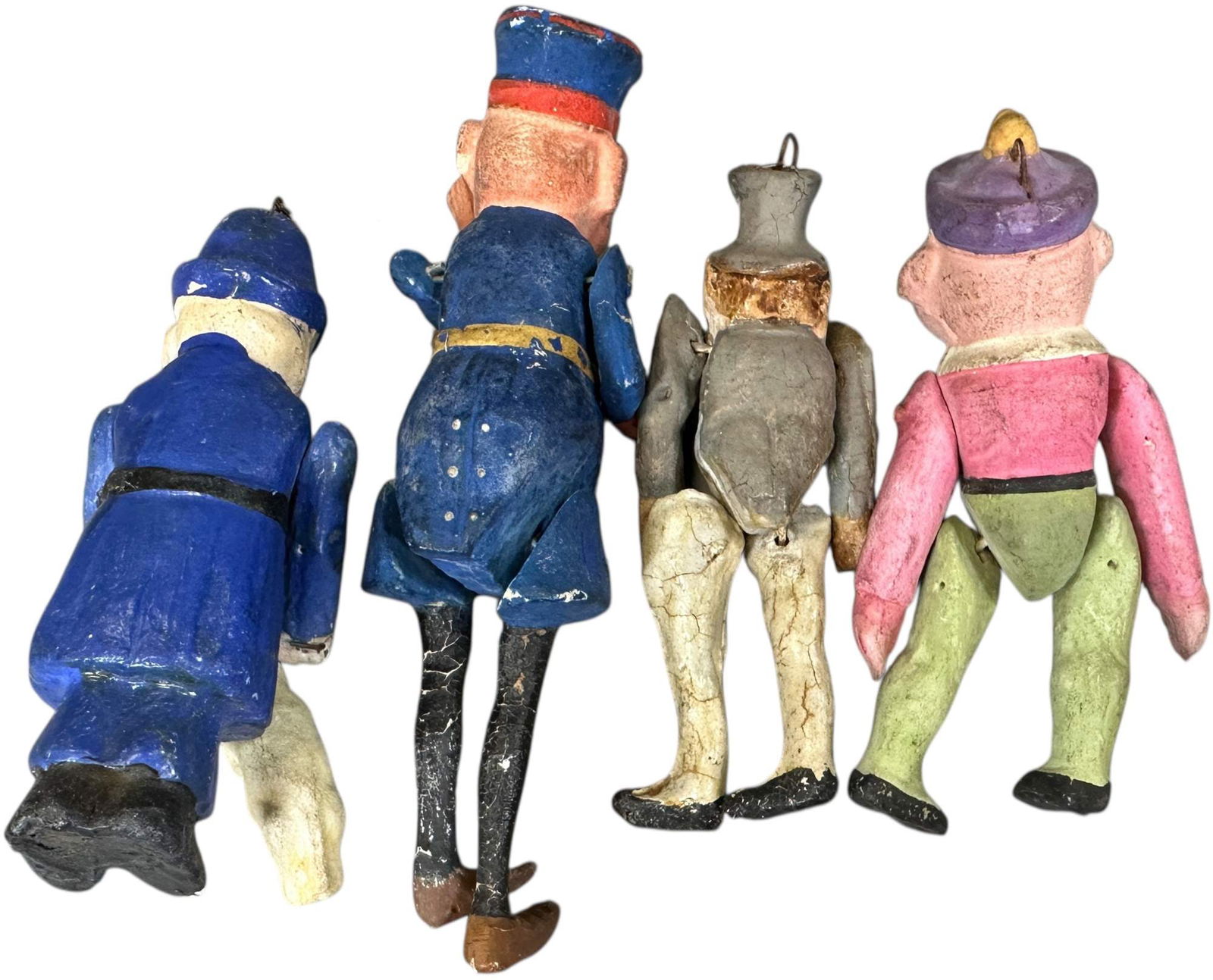 FOUR STRINGED FIGURES INCLUDES TWO BOBBIES - 4