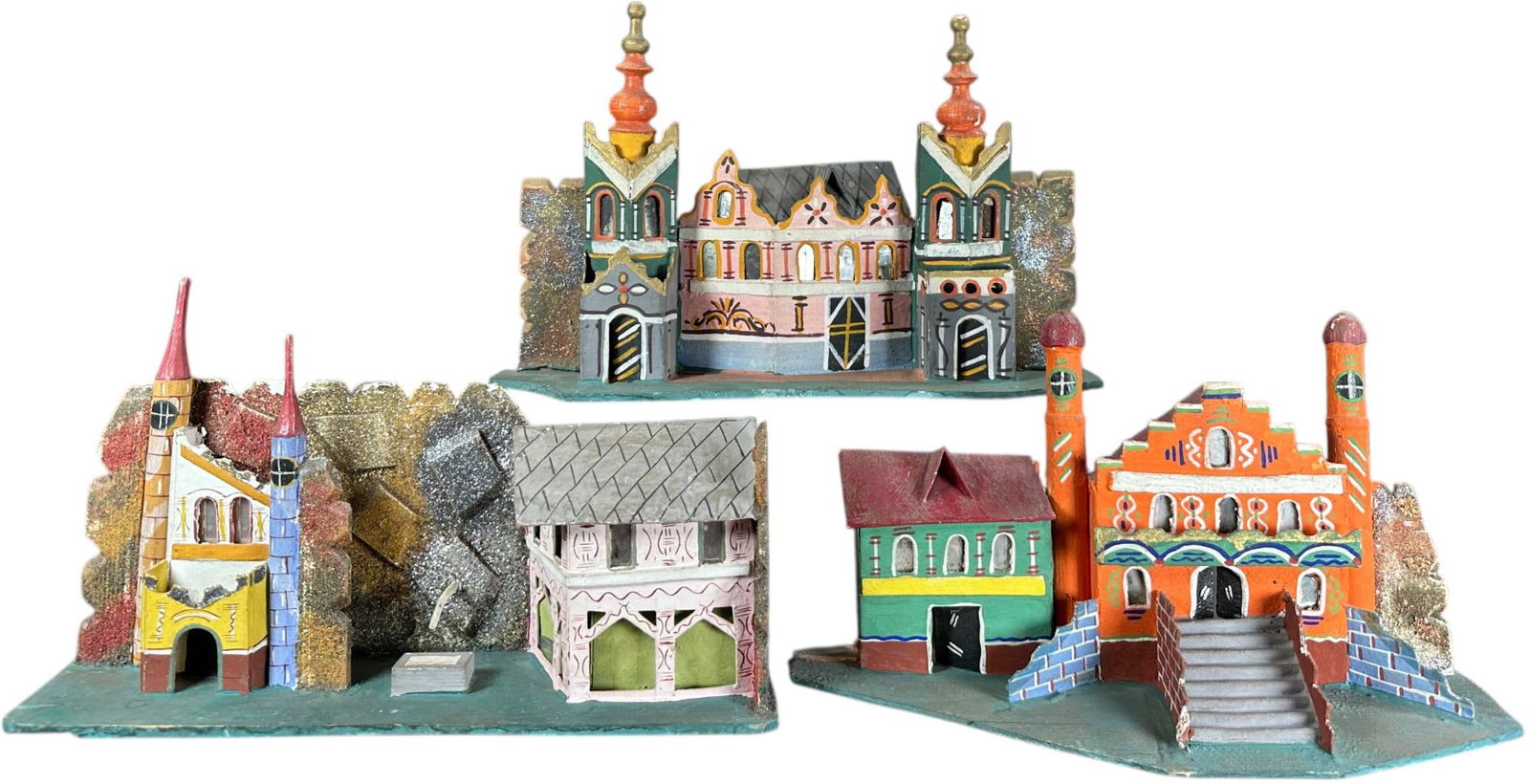 SET OF THREE GERMAN VILLAGE SCENES: 1404. SET OF THREE GERMAN VILLAGE SCENES | Three different Candle house scenes made in Germany. | 13" l. | (Excellent Condition) | $400 - $700