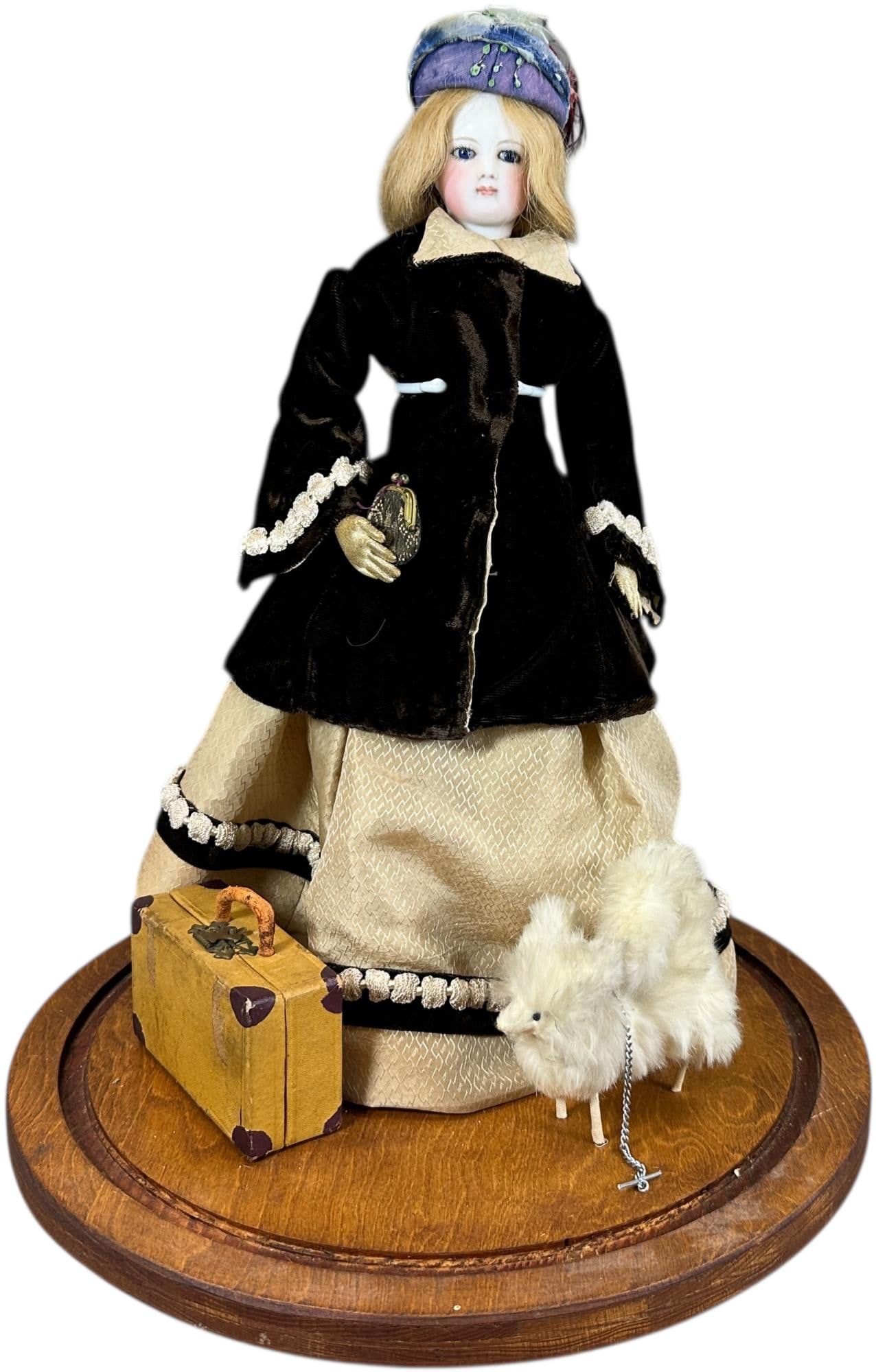 VIGNETTE UNDER DOME FRENCH FASHION DOLL W/ DOG: 1422. VIGNETTE UNDER DOME FRENCH FASHION DOLL W/ DOG | French fashion with unmarked head but attributed to Jumeau, circa 1880's, separate bisque shoulder, white kid body with separate fingers,