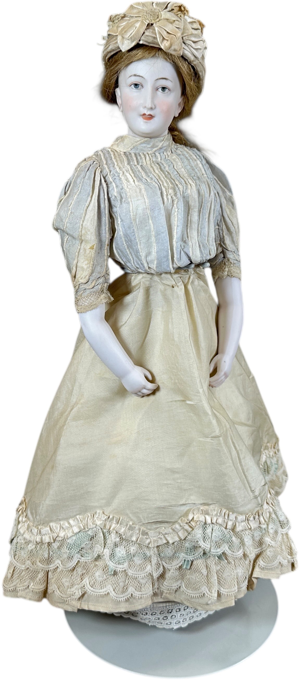 UNUSUAL FASHION DOLL: 1426. UNUSUAL FASHION DOLL | Bisque swivel head on separate bisque shoulder, all molded and painted facial features, mounted on narrow waist firm laether body, long bisque heavy arms extend to elbow l