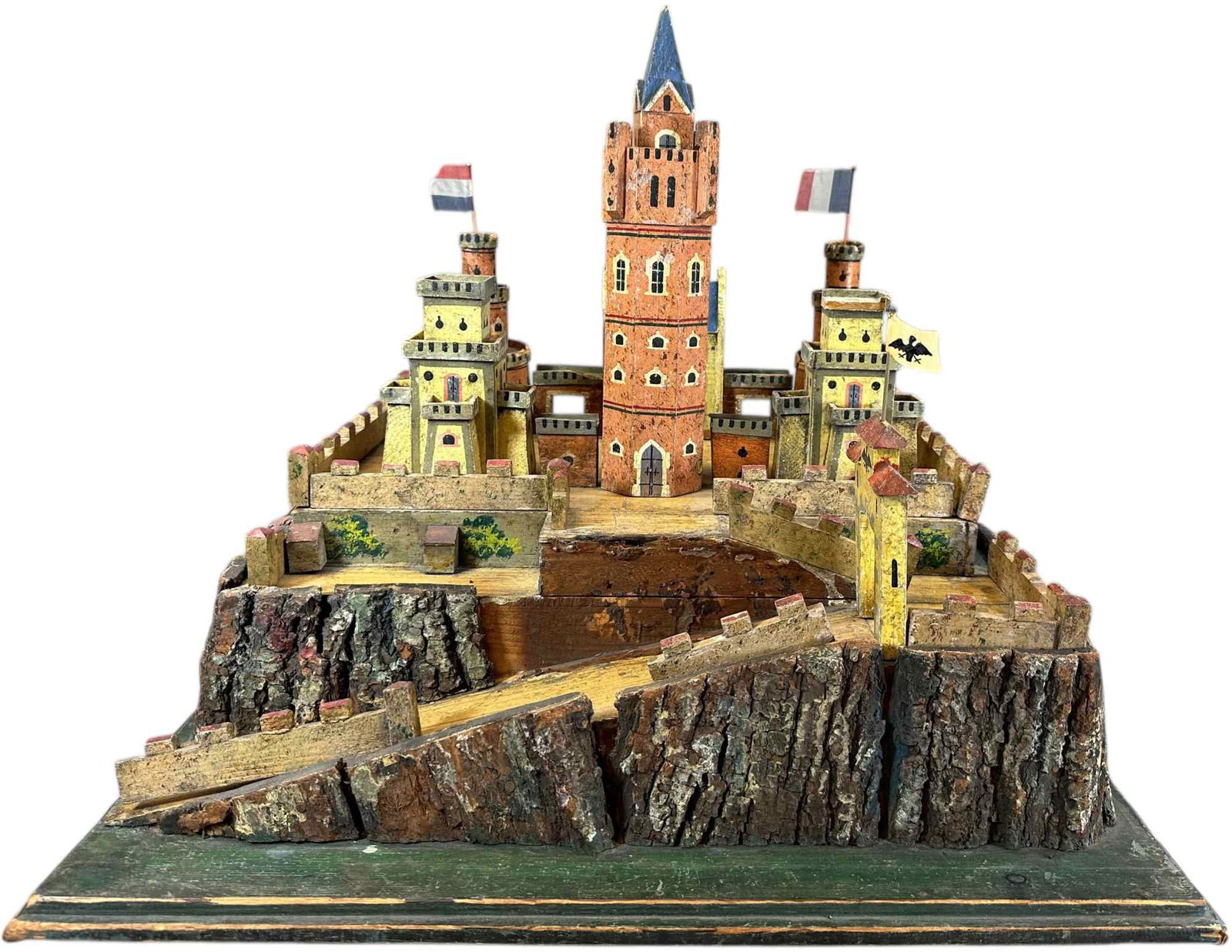 EARLY GERMAN WOODEN CASTLE: 1435. EARLY GERMAN WOODEN CASTLE | Provenance: David Bausch Collection. | 20" l. x 22" h. | Some sections of castle fence/wall is over-painted, otherwise (Excellent Condition) | $700 - $1,100