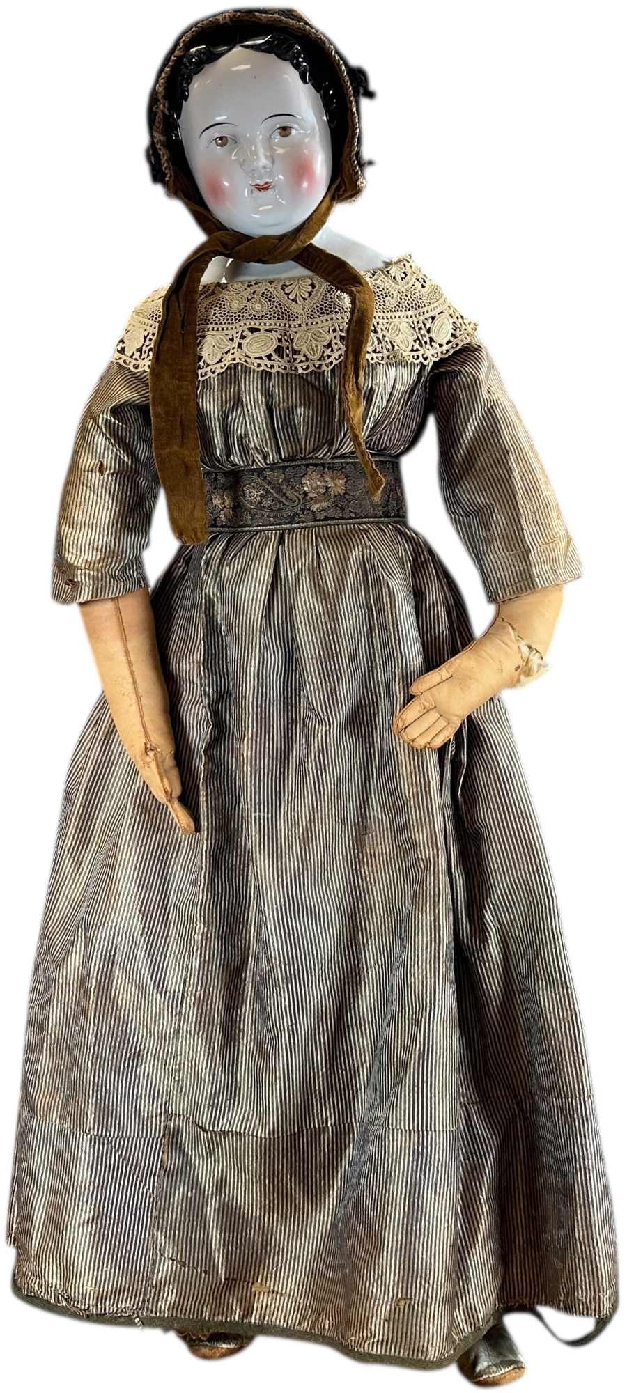 BIGGER THAN LIFE SIZE BRON EYED CHINA DOLL: 1446. BIGGER THAN LIFE SIZE BRON EYED CHINA DOLL | German glazed porcelain shoulder head doll, brown painted eyes, stuffed cloth body, newer vintage, brown leather arms, age appropriate clothing. | 36