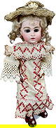 CABINET SIZE CIRCLE/DOT BRU BEBE: 1455. CABINET SIZE CIRCLE/DOT BRU BEBE | Sweet desirable 1880's doll incised "Bru Jne 1" with Moon and Crescent logo on head and "BRU JNE" on left shoulder, "N.1" on right shoulder, original gusseted