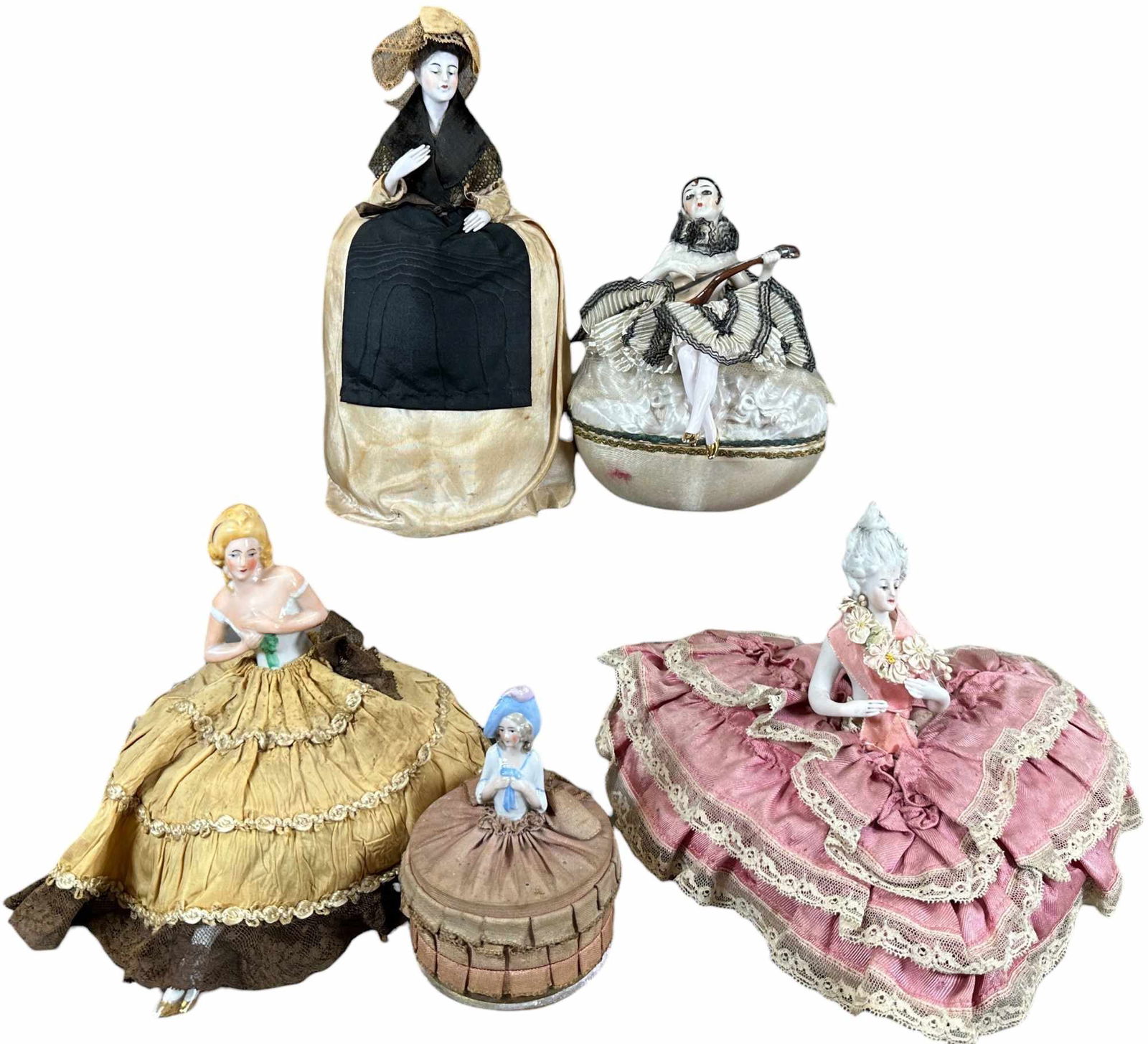 FIVE UNIQUE HALF-DOLL TYPE COMPLETE ASSEMBLAGES: 1507. FIVE UNIQUE HALF-DOLL TYPE COMPLETE ASSEMBLAGES | Half dolls were manufactured primarily to be the focal point of a more whimsical object. These five dolls exemplify just that, the tallest is a