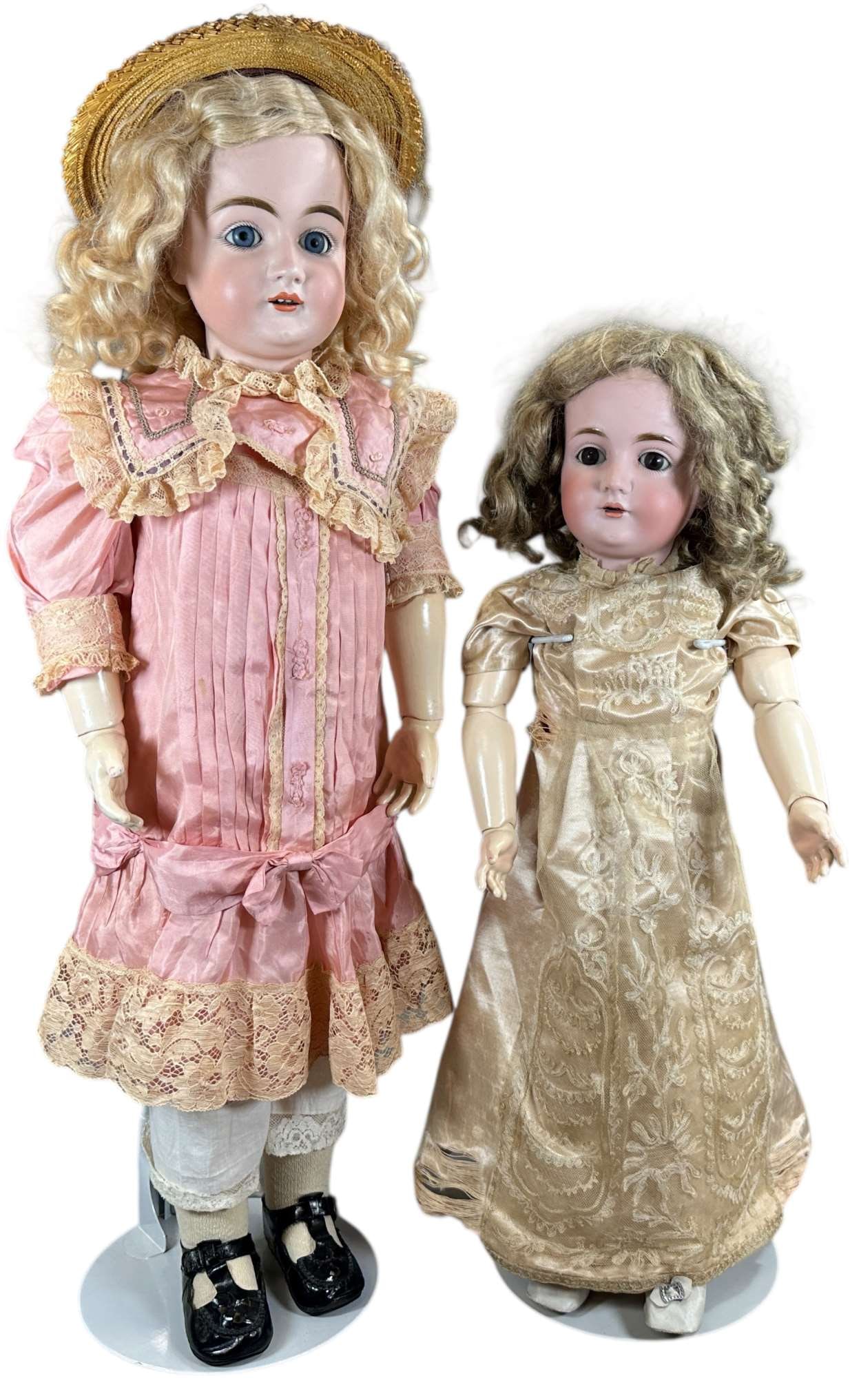 TWO VERY PRETTY KESTNER CHILD DOLLS: 1513. TWO VERY PRETTY KESTNER CHILD DOLLS | Larger doll is incised "L.made in Germany.15", with blue glass sleep eyes, antique blonde wig over original plaster pate, nicely appointed dress, hat
