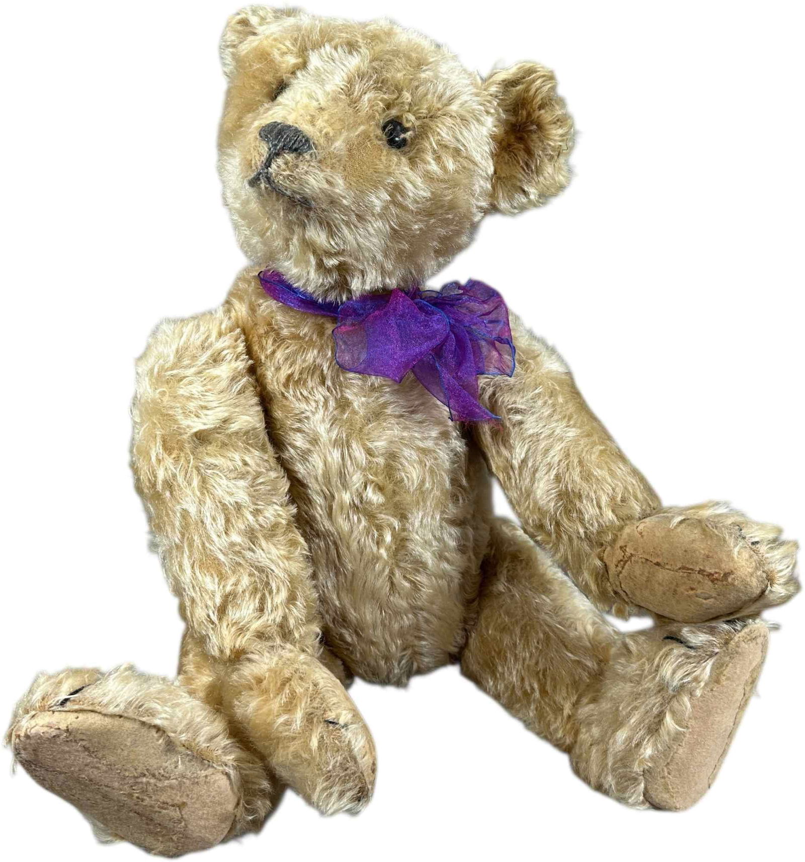 1907 STEIFF CENTER SEAM BEAR: 1517. 1907 STEIFF CENTER SEAM BEAR | Pre WWI, FF ear button. | 25" h. | Nose and mouth stitching replaced, pads repaired, overall (Very Good Condition) | $2,000 - $3,500