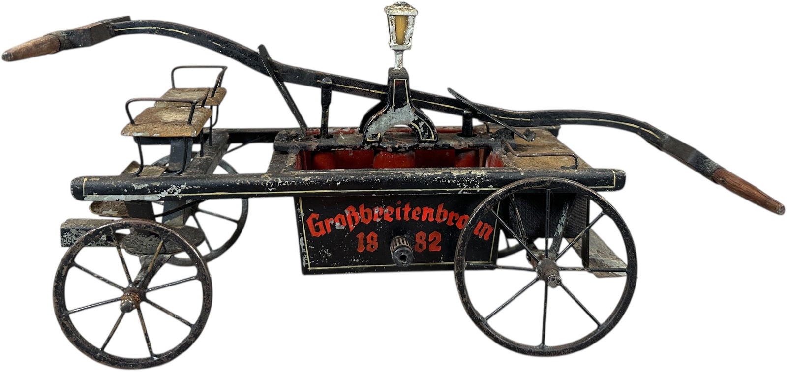1882 BUCHNER FIRE PUMPER ENGINE: 67. 1882 BUCHNER FIRE PUMPER ENGINE | Germany, a very early commemorative piece commissioned by the village of Grossbreitenbronn's fire department. | 13" l. | Original in (Very Good Condition) | $2,00