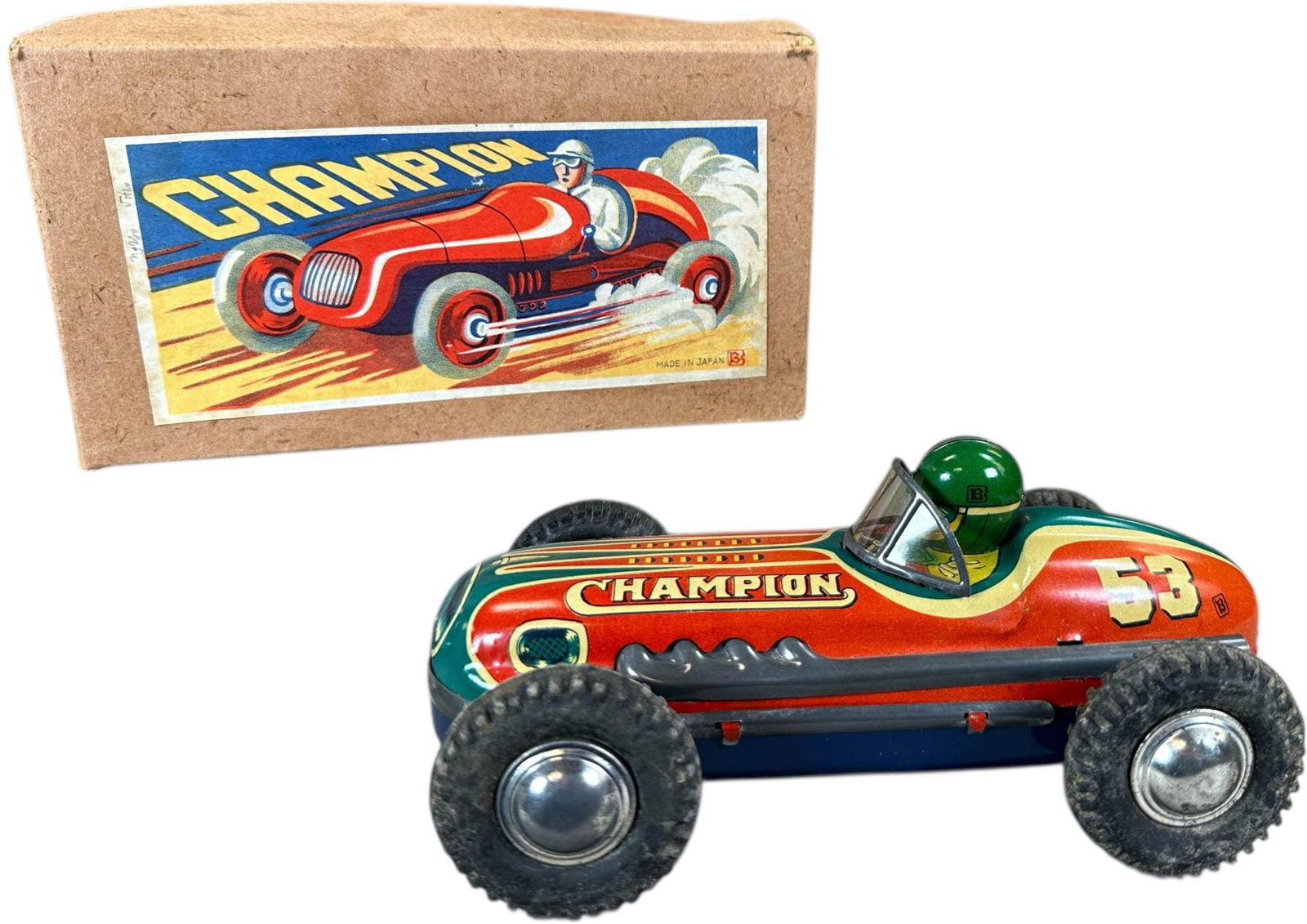 BOXED BANDAI CHAMPION RACER 53: 233. BOXED BANDAI CHAMPION RACER 53 | Japan, friction motor driven. | 7.5" l. | (Pristine to Near Mint Condition) | $300 - $500