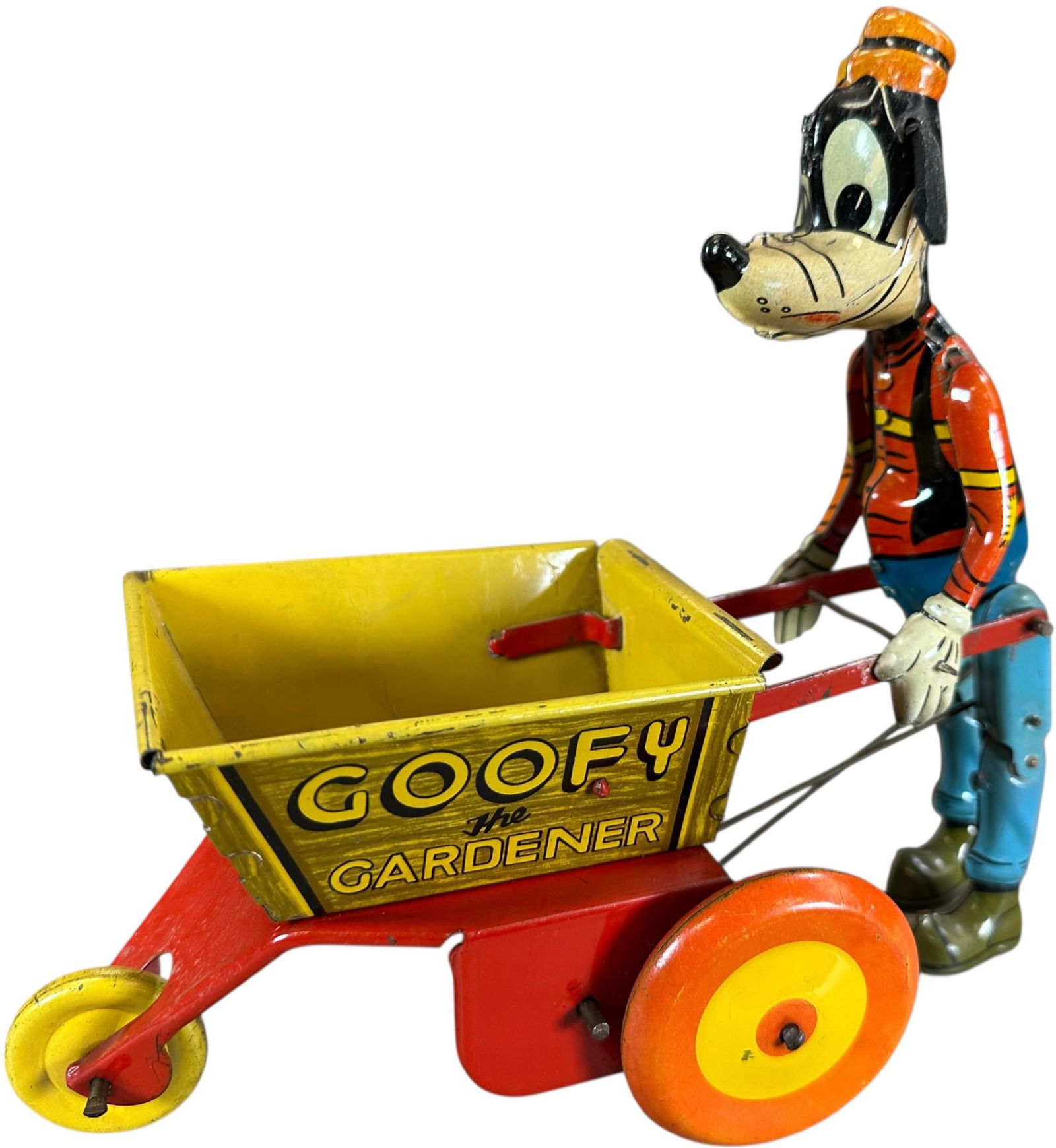 MARX GOOFY THE GARDENER: 378. MARX GOOFY THE GARDENER | USA, wind-up motor driven. | 8.5" l. | Replaced ears (Very Good to Excellent Condition) | $200 - $400