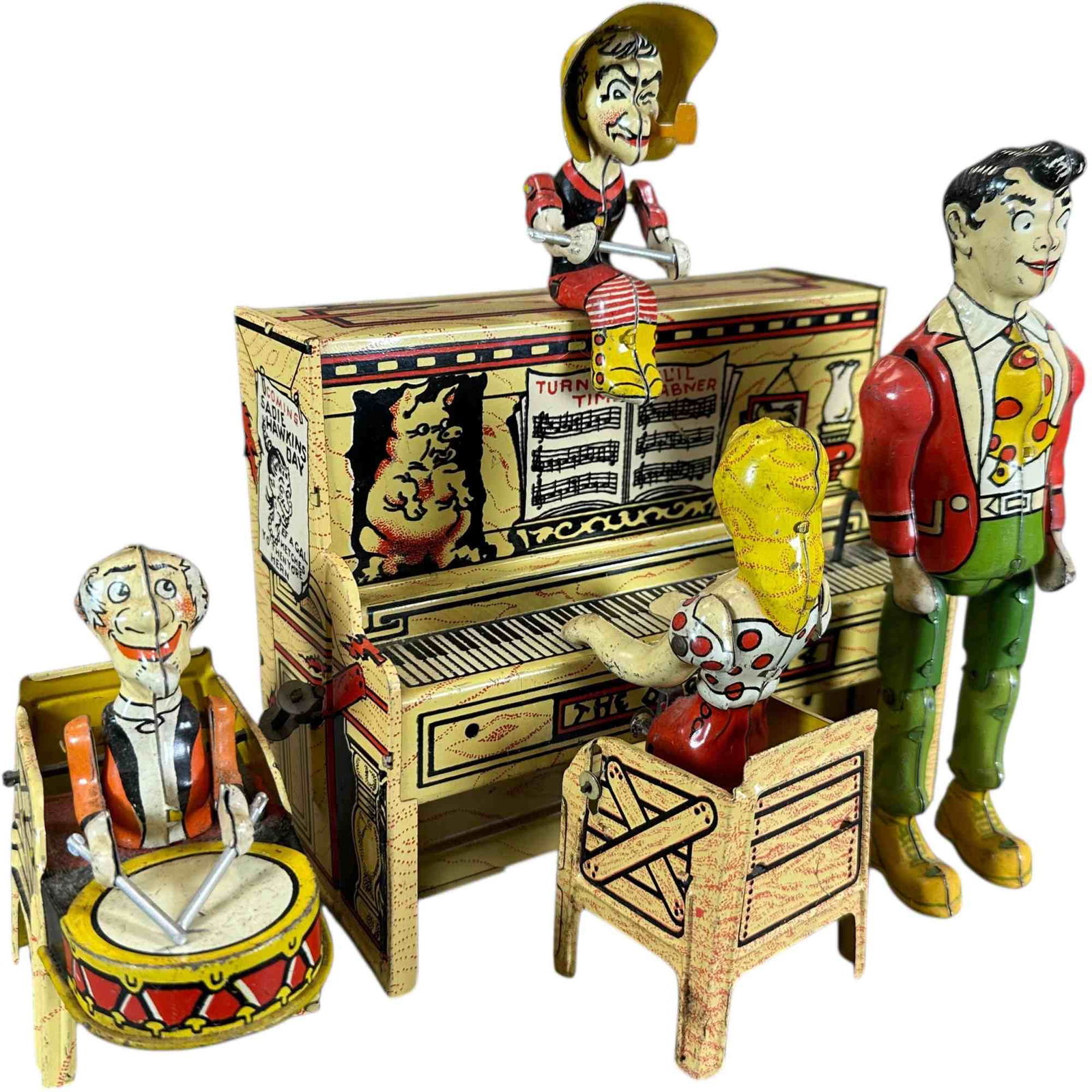 UNIQUE ART LIL ABNER DOGPATCH BAND: 412. UNIQUE ART LIL ABNER DOGPATCH BAND | USA, wind-up motor driven. | 9" h. | (Excellent Condition) | $200 - $400