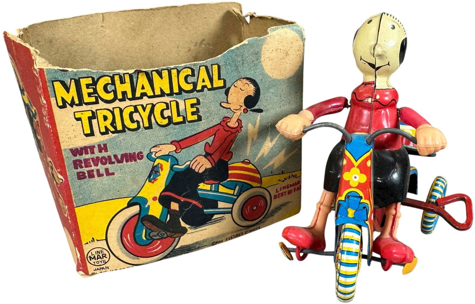 BOXED LINEMAR OLIVE OYL ON TRICYCLE: 458. BOXED LINEMAR OLIVE OYL ON TRICYCLE | Japan, working wind-up motion and bell ringing. | 3.5" l. | Box missing top flaps and has tear to one side, toy in (Excellent Condition) | $400 - $700