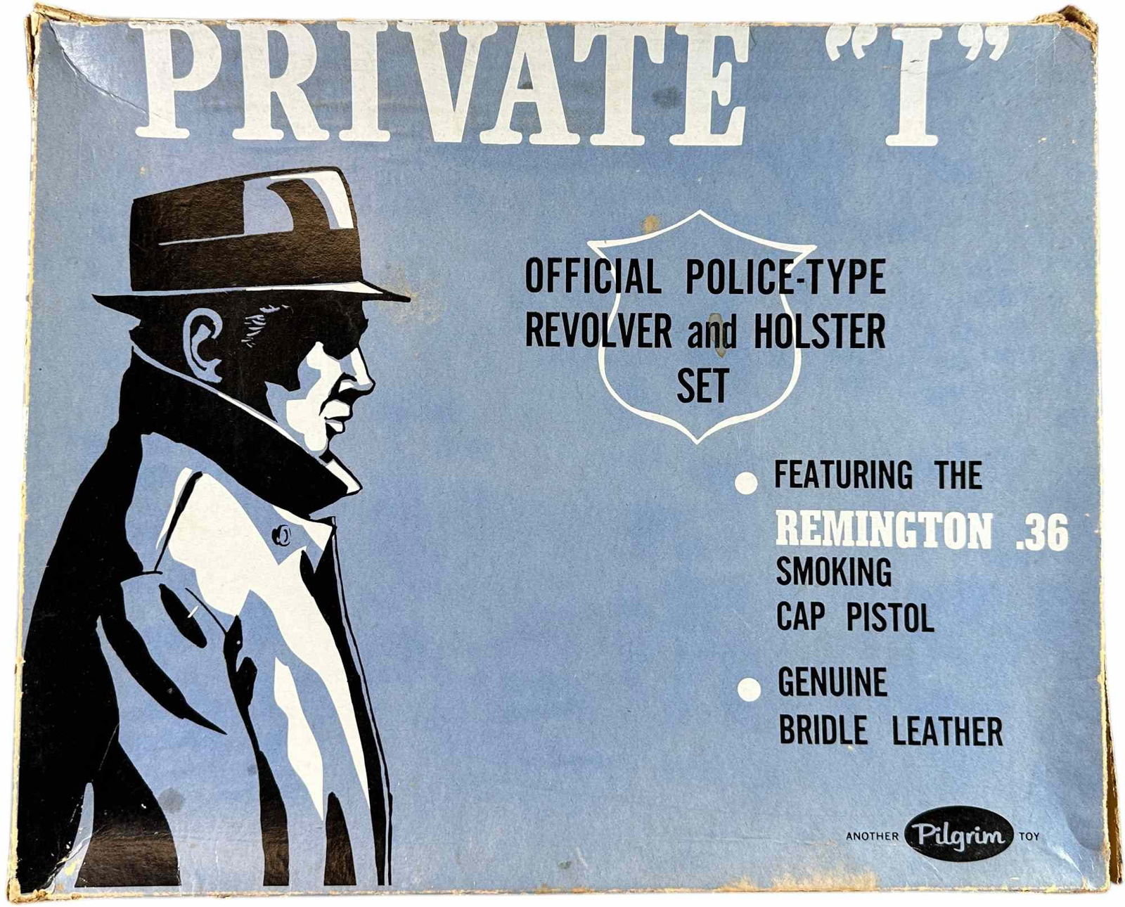 BOXED PLIGRIM TOYS PRIVATE I POLICE SET: 483. BOXED PLIGRIM TOYS PRIVATE I POLICE SET | 7.5" l. revolver | Old store stock with minor tears to flaps of lid, (Pristine Condition) | $150 - $300