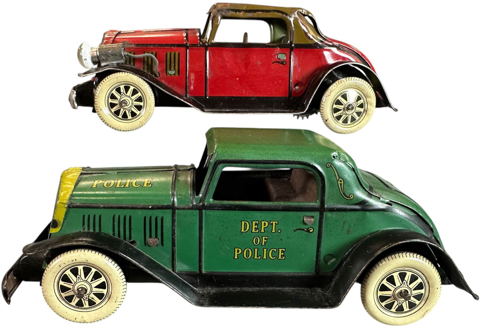 MARX POLICE & COUPE W/ HEADLIGHTS: 528. MARX POLICE & COUPE W/ HEADLIGHTS | 8" l. | Red car in (Very Good to Excellent Condition), Police green car in (Excellent Condition) | $250 - $500