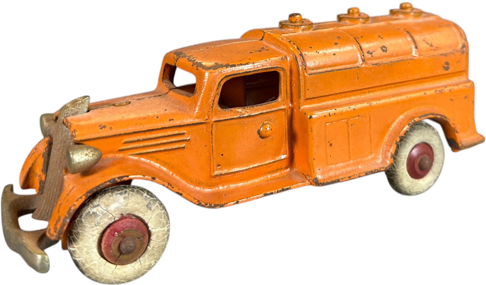 KENTON OIL TANKER TRUCK: 22. KENTON OIL TANKER TRUCK | c. 1936, very rare example. Provenance: The 2004 Dick Ford Collection #882. Ex: Tony Lasala Collection. | 7.5" l. | Other than some sporadic edge chipping toy is in