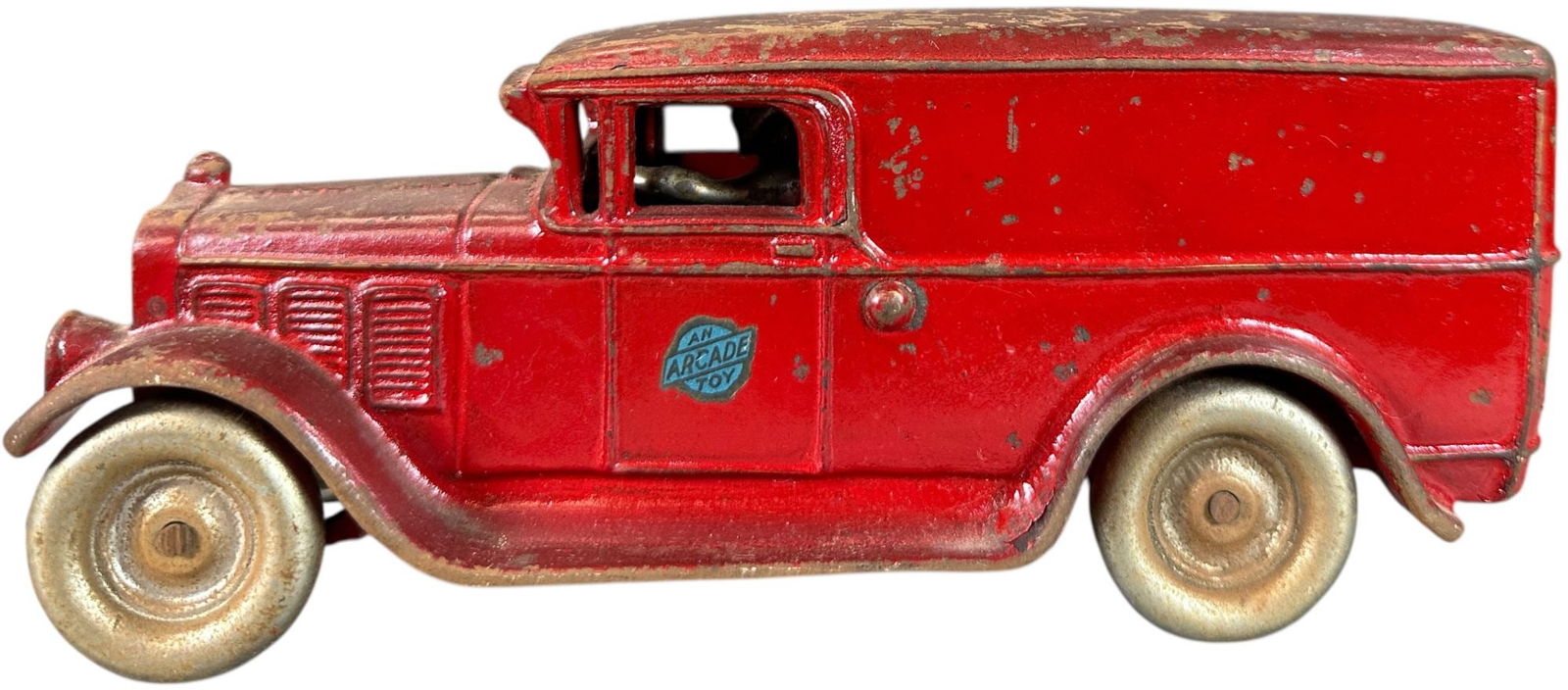 ARCADE WHITE DELIVERY PANEL VAN: 24. ARCADE WHITE DELIVERY PANEL VAN | Ex: Tony Lasala Collection. | 8.5" l. | Paint chips primarily to roof, otherwise toy likely can be polish to improve from (Very Good Condition) to (Excellent Cond